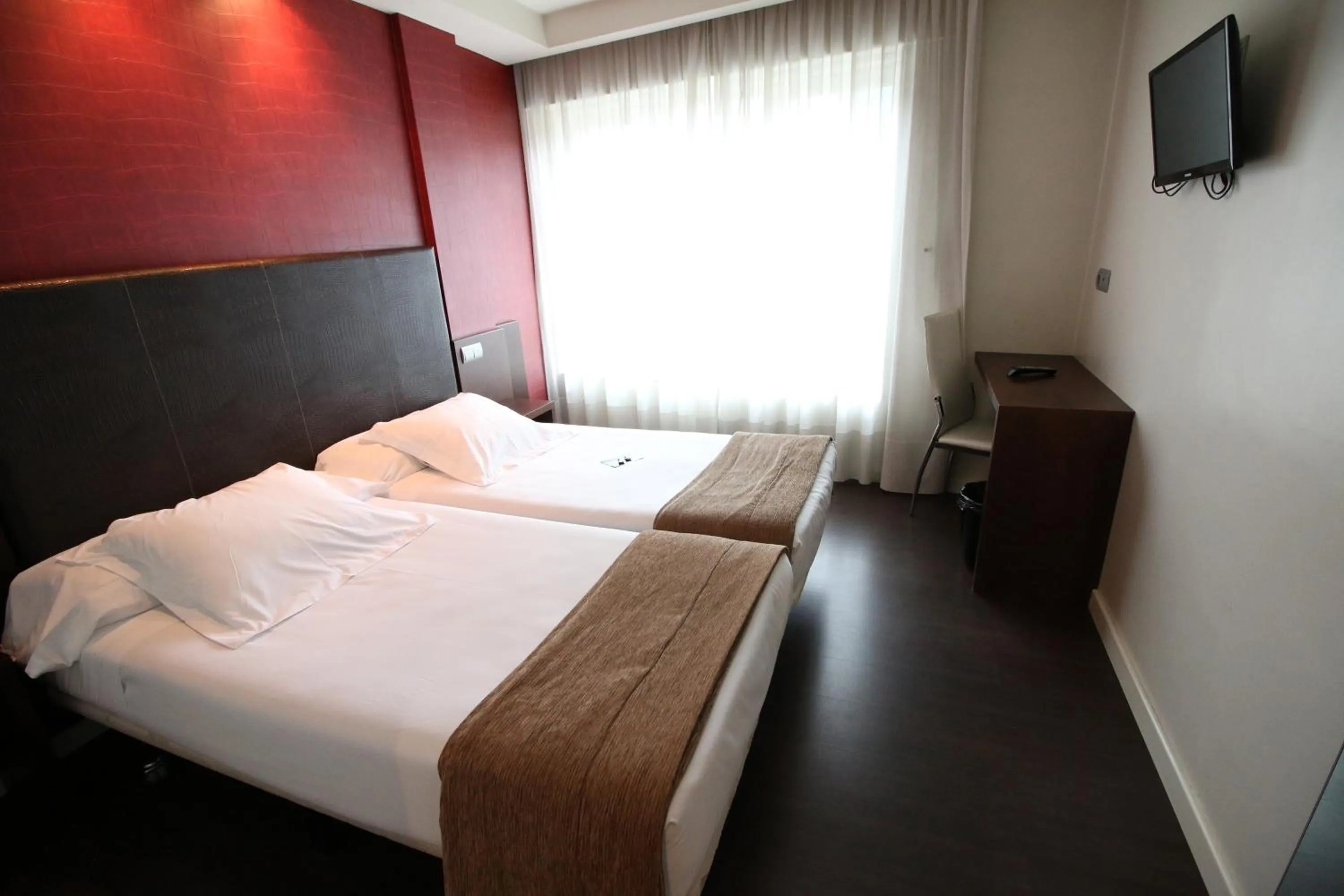 Bed in Hotel Alda San Carlos