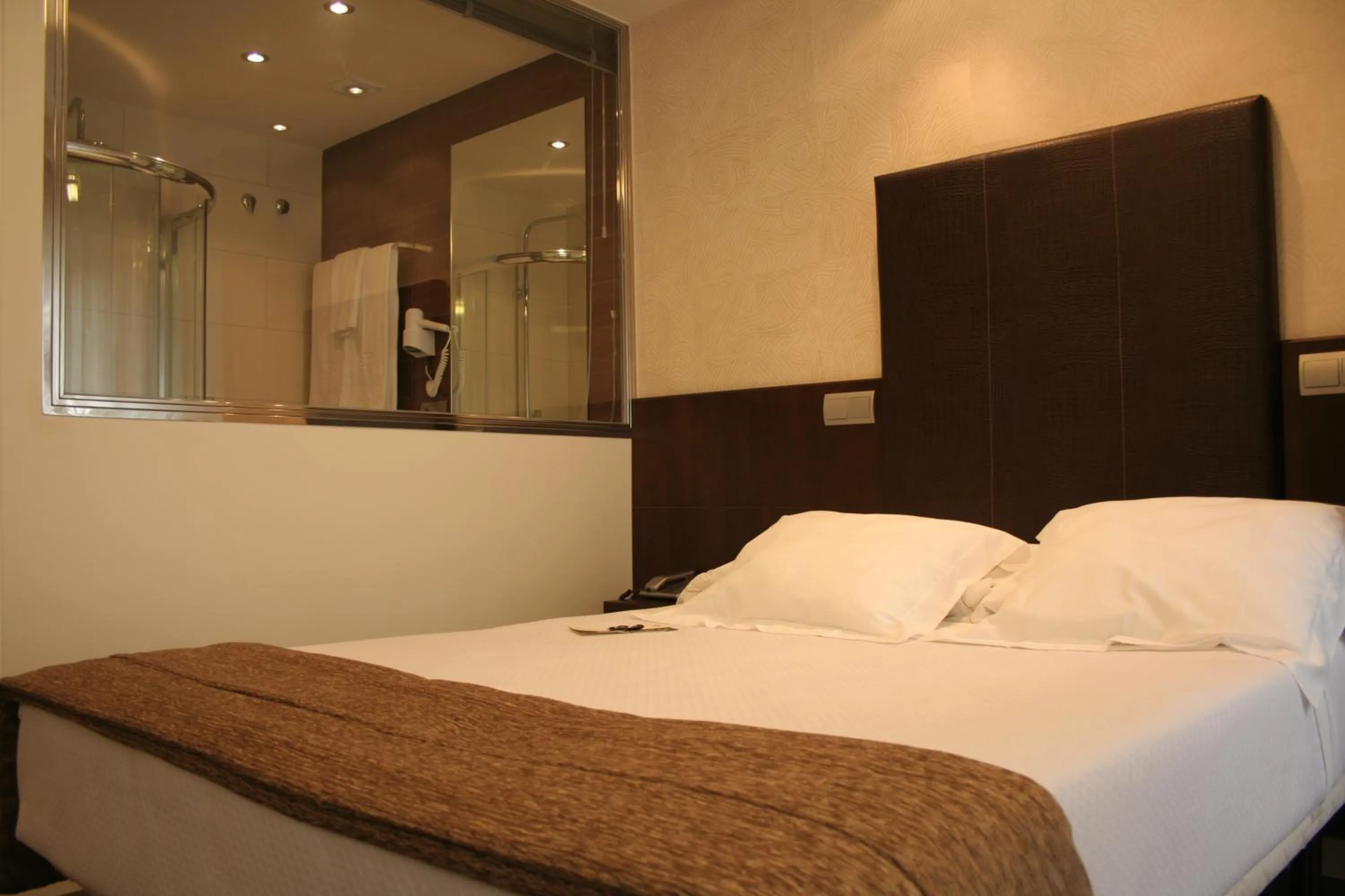 Bed in Hotel Alda San Carlos