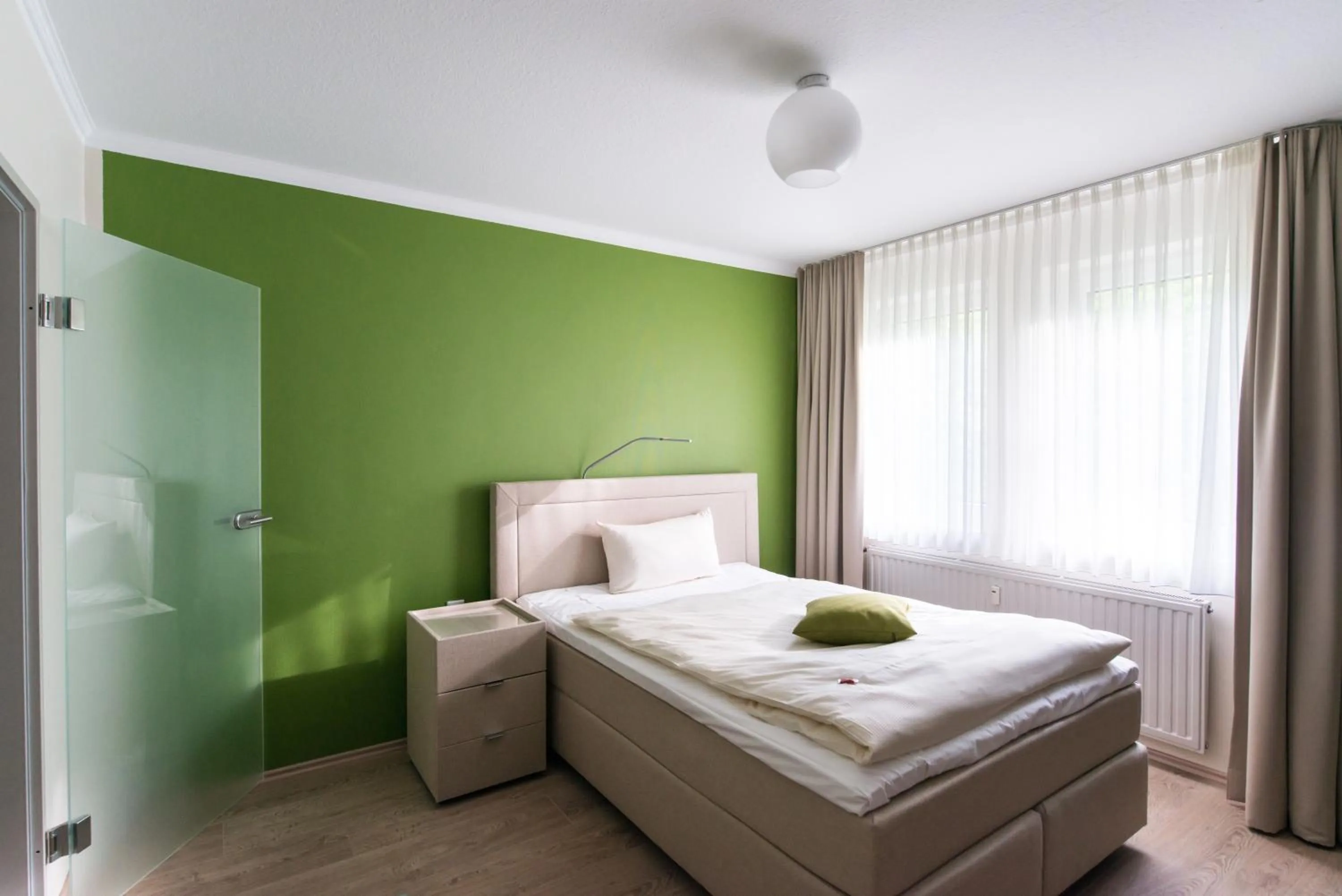 Bed in Hotel am Herkules