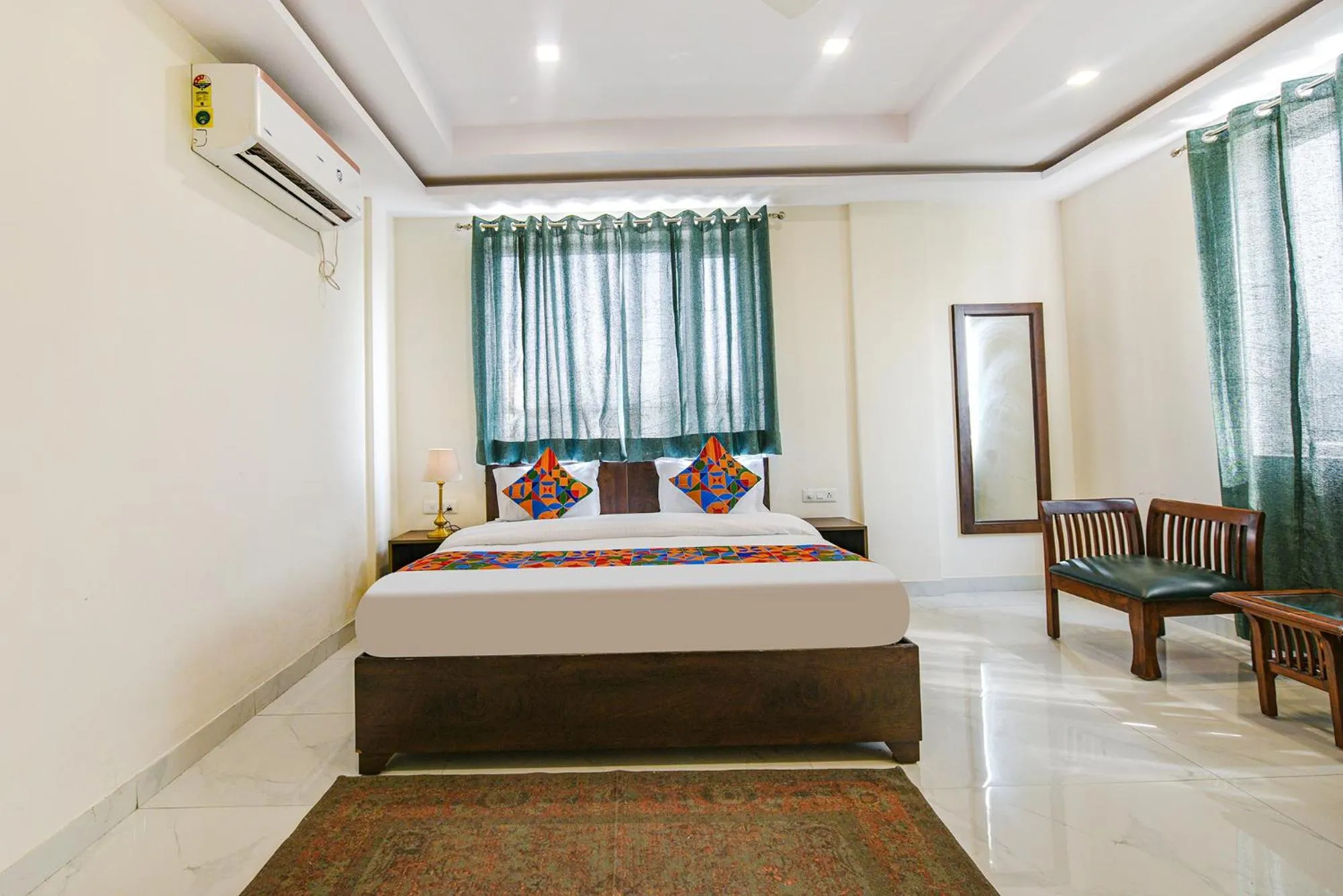 Bed in FabHotel Jaswinder Bhawan