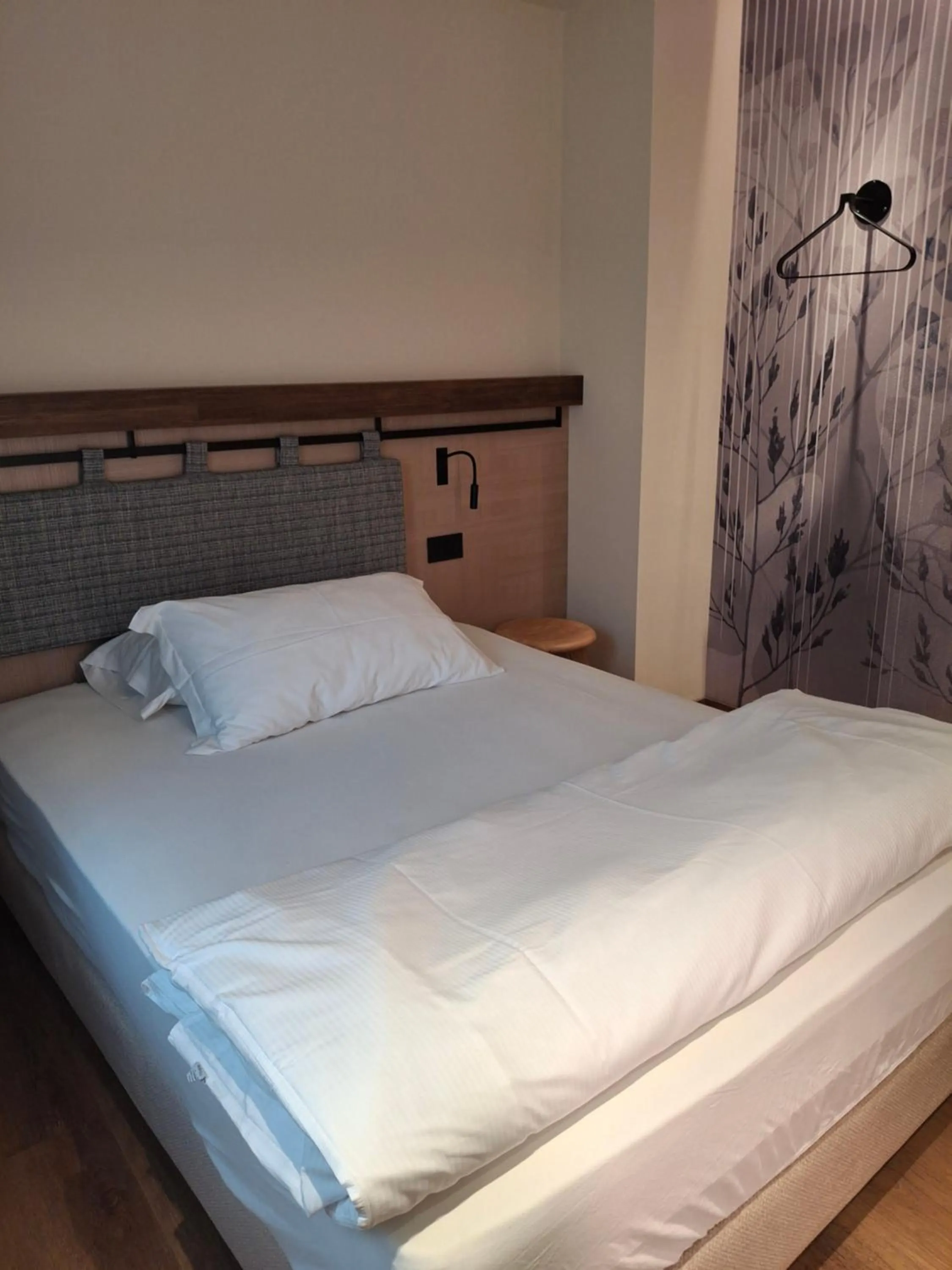 Bed in Hotel Dolomiti Saone