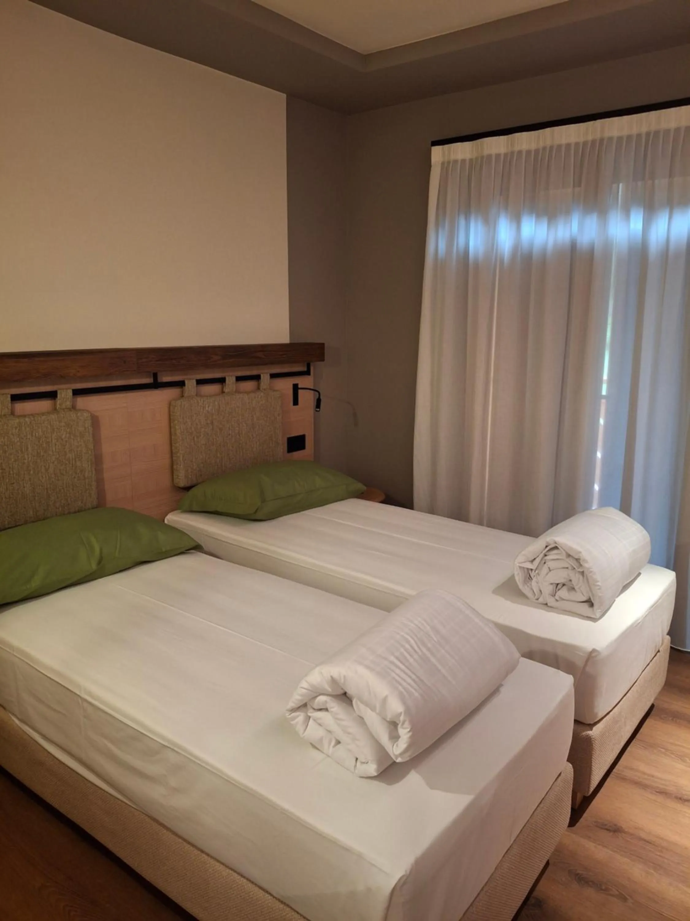 Bed in Hotel Dolomiti Saone