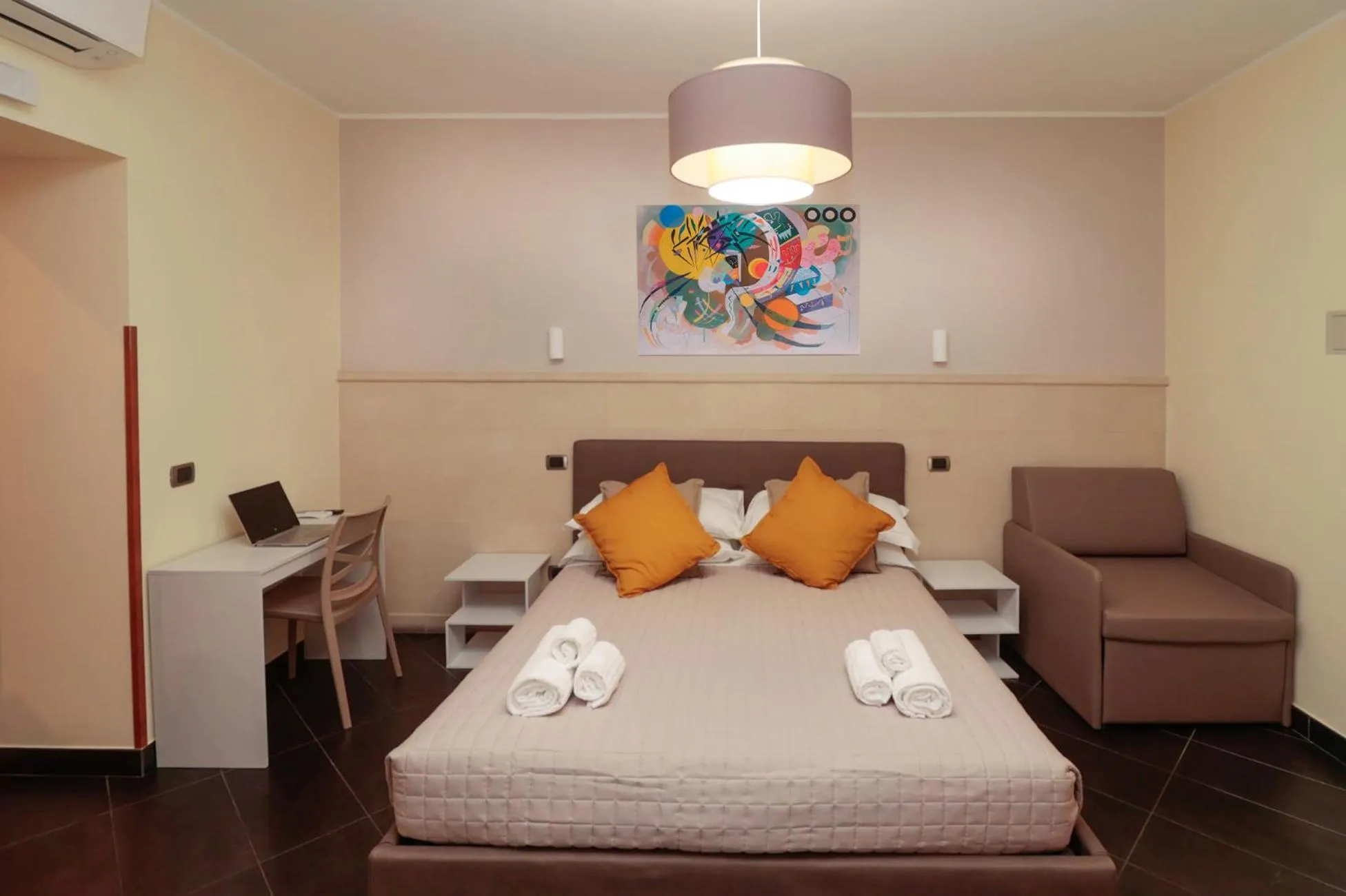 Bed in Cardinal Vatican Inn