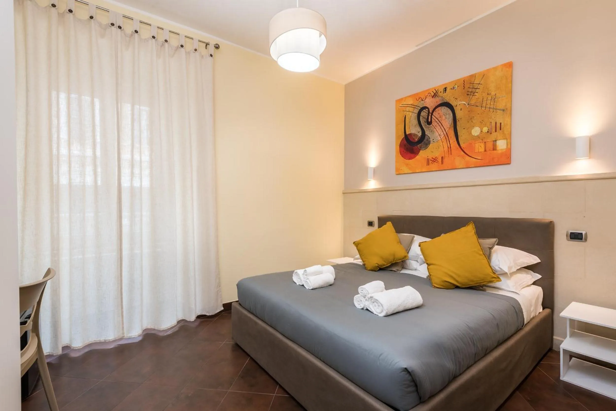 Bed in Cardinal Vatican Inn