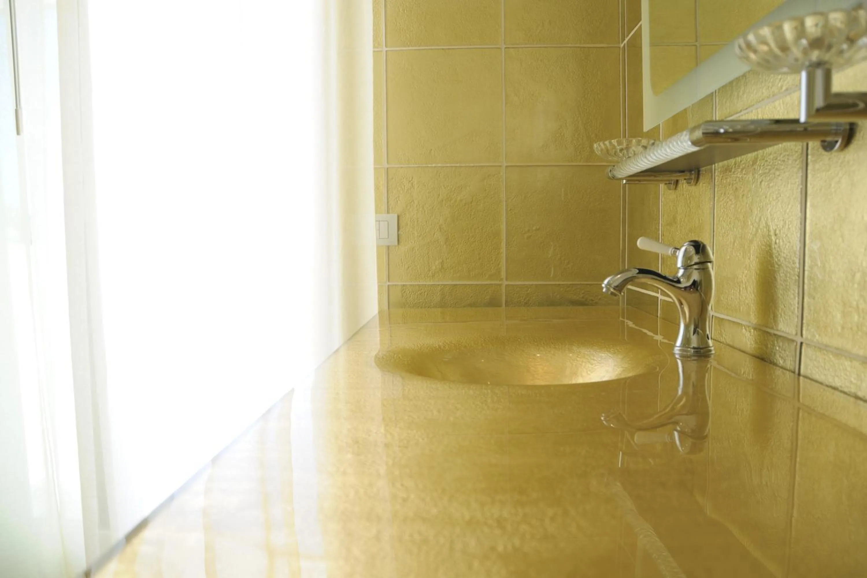 Bathroom in Hotel Conchiglia