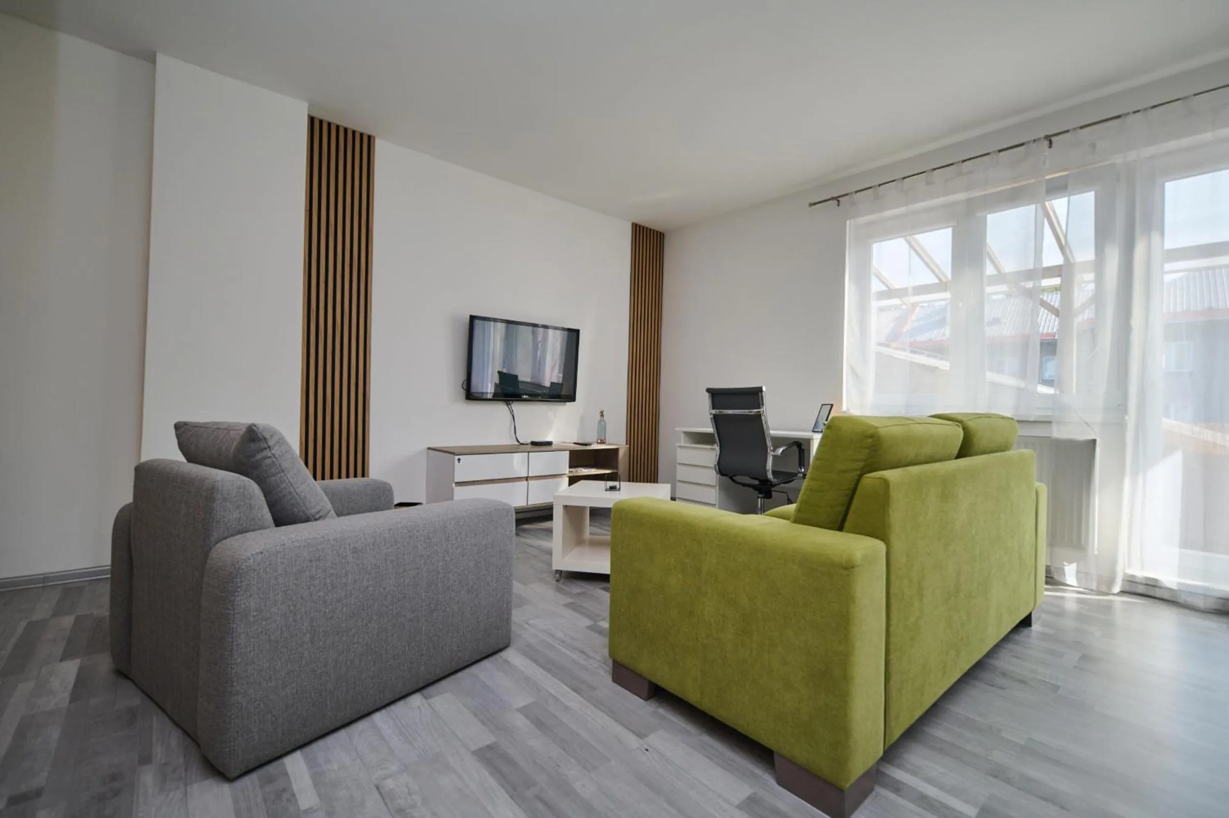 Communal lounge/ TV room in Central Apartments