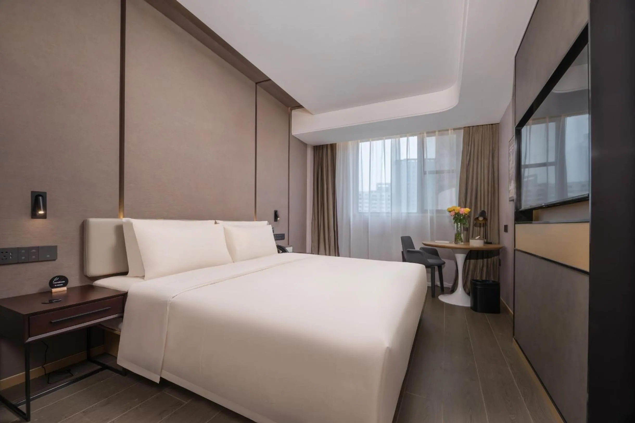 Bed in Atour Hotel Nantong Jinsha
