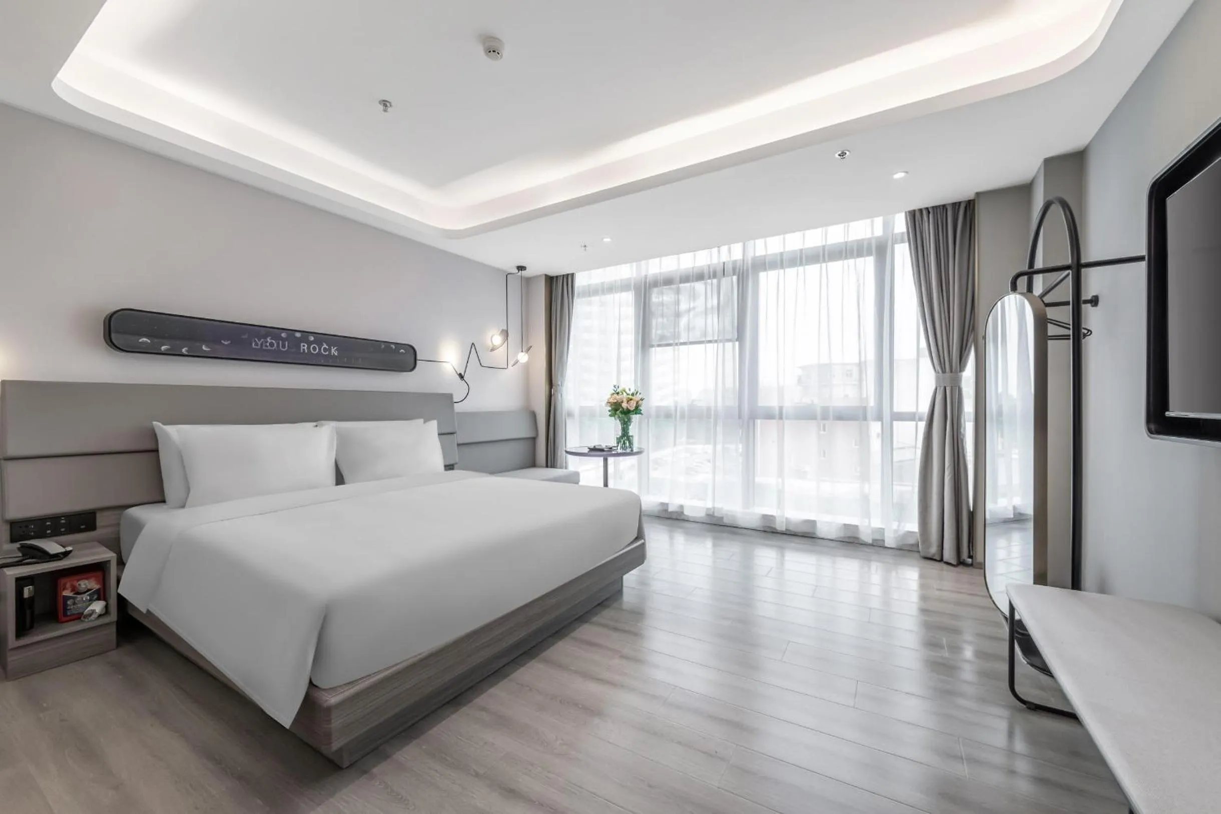 Bed in Atour X Hotel Yangzhou East Station Li Ning Sports Park