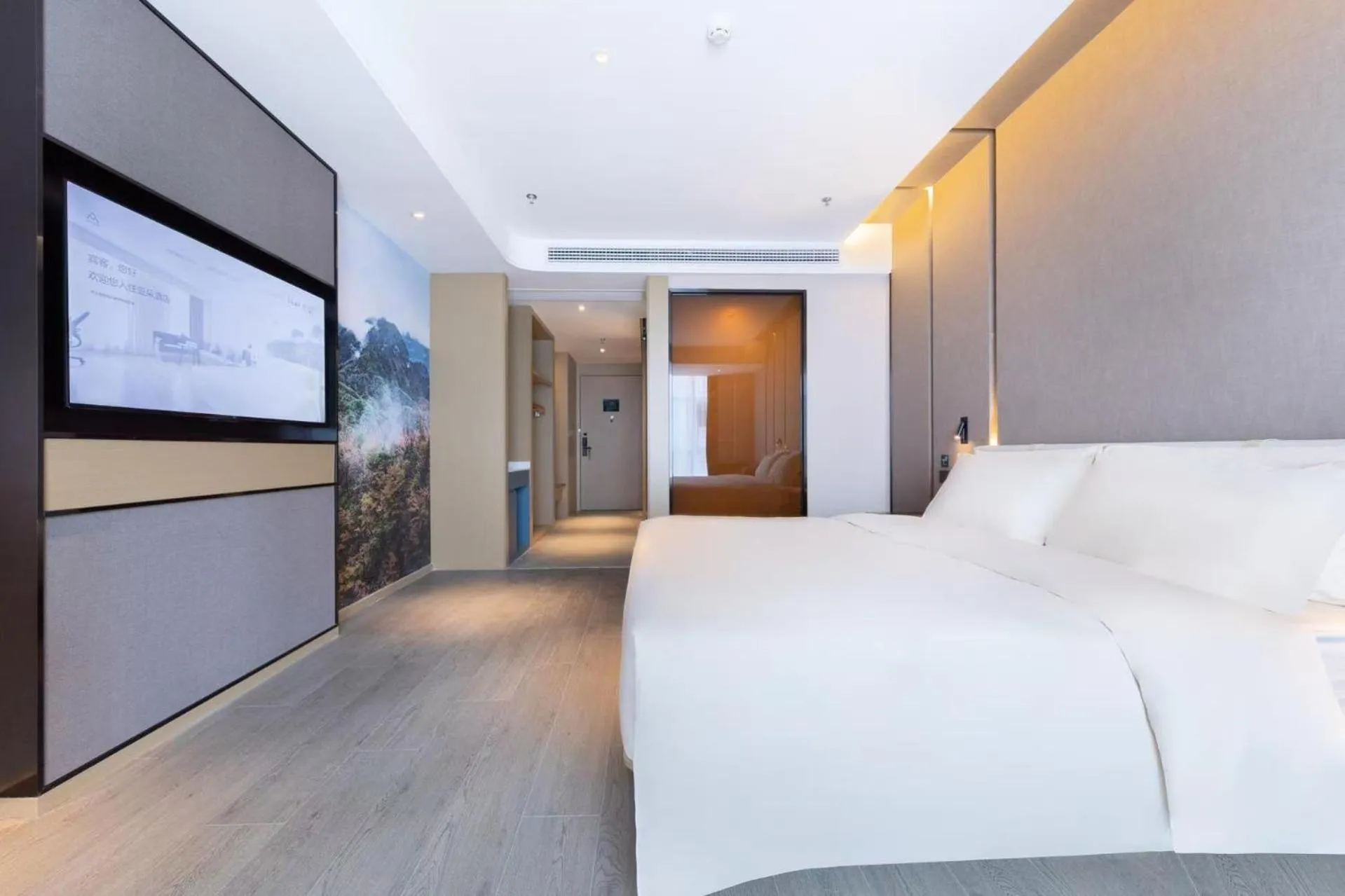 Photo of the whole room, Bed in Atour Hotel Yibin West Railway Station