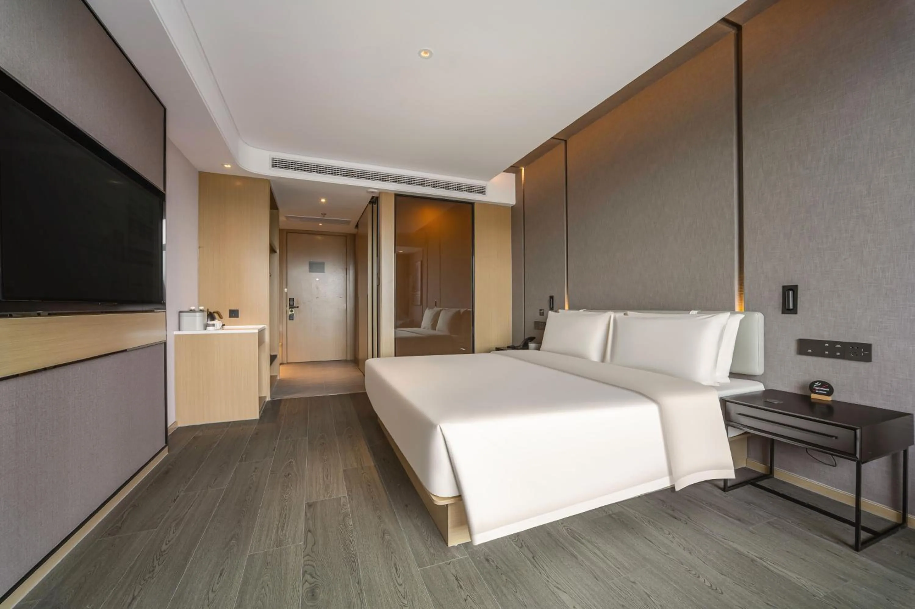 Living room, Bed in Atour Hotel Wuxi New District Nanchan Temple Scenic Area