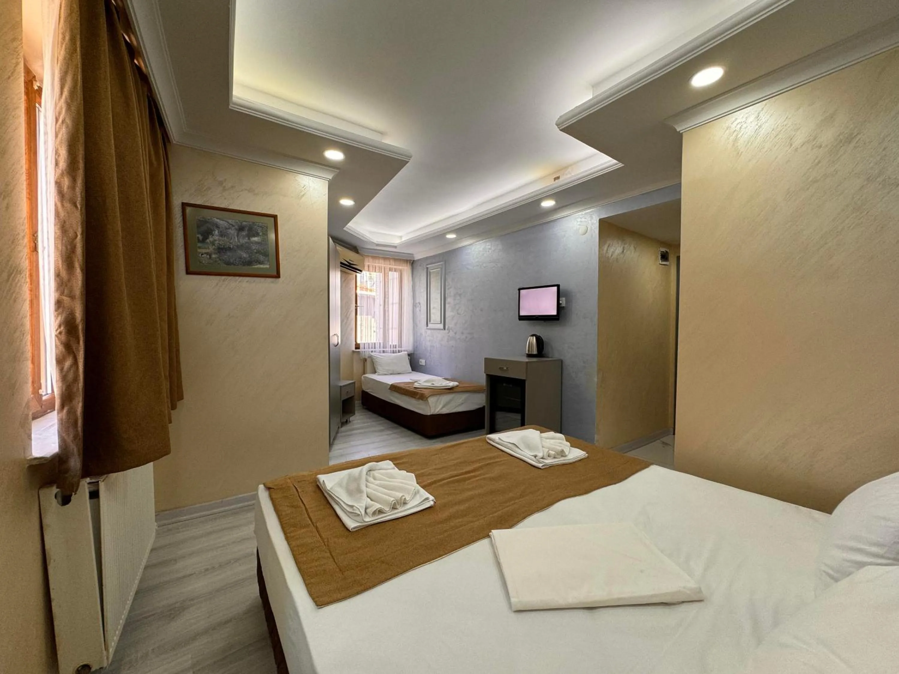 Bed in Grand Kybele Hotel