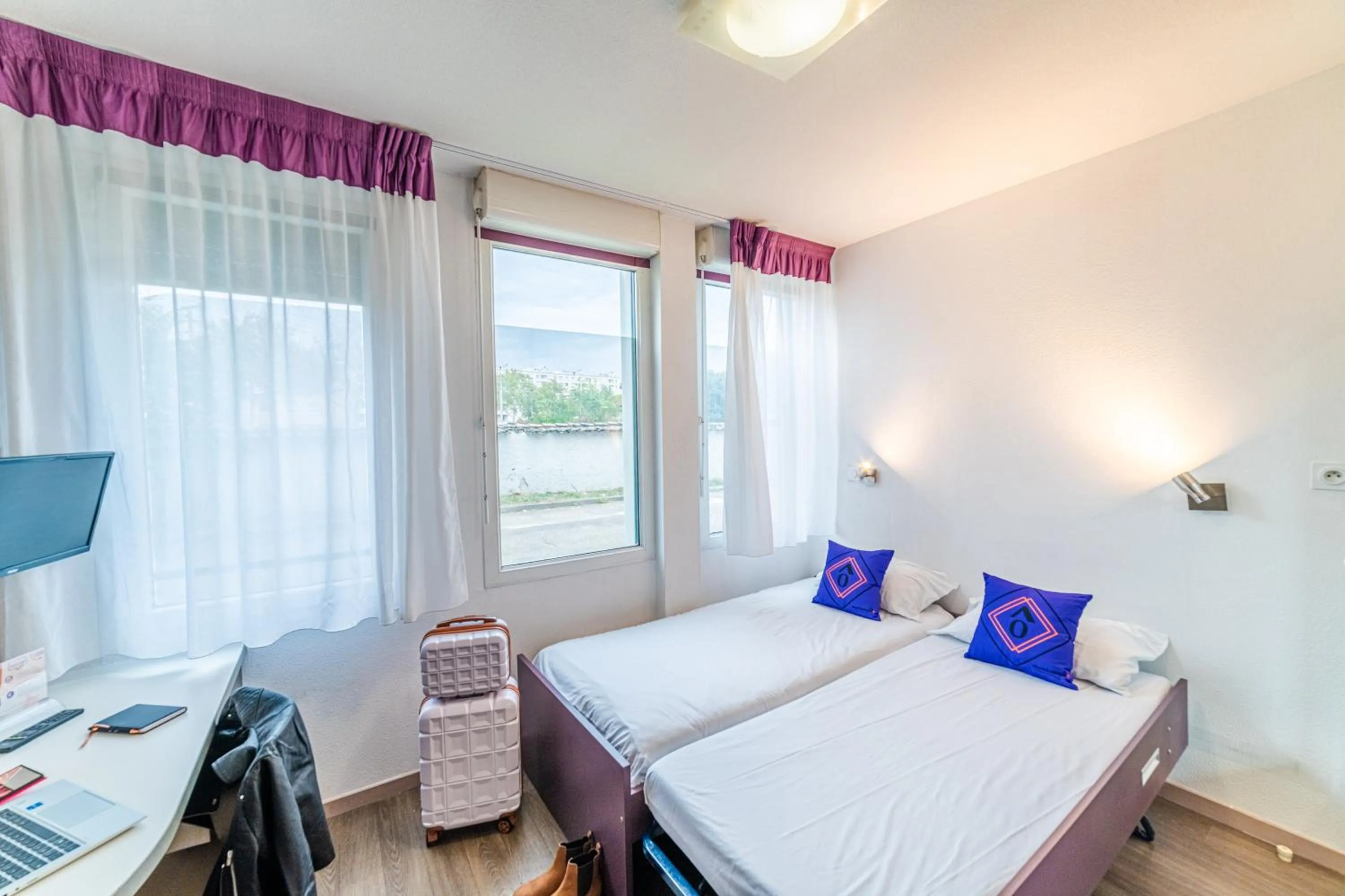 Bed in Montempô Appart'hôtel Lyon Viviani