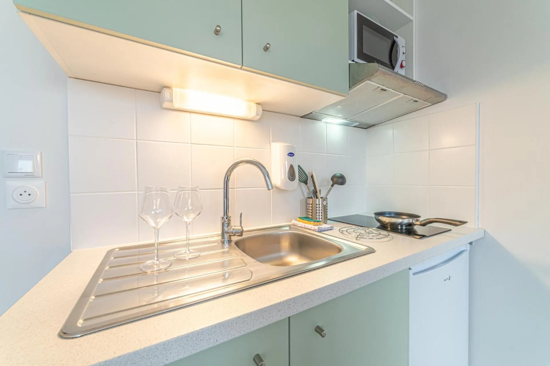 Kitchen or kitchenette in Montempô Appart'hôtel Lyon Viviani