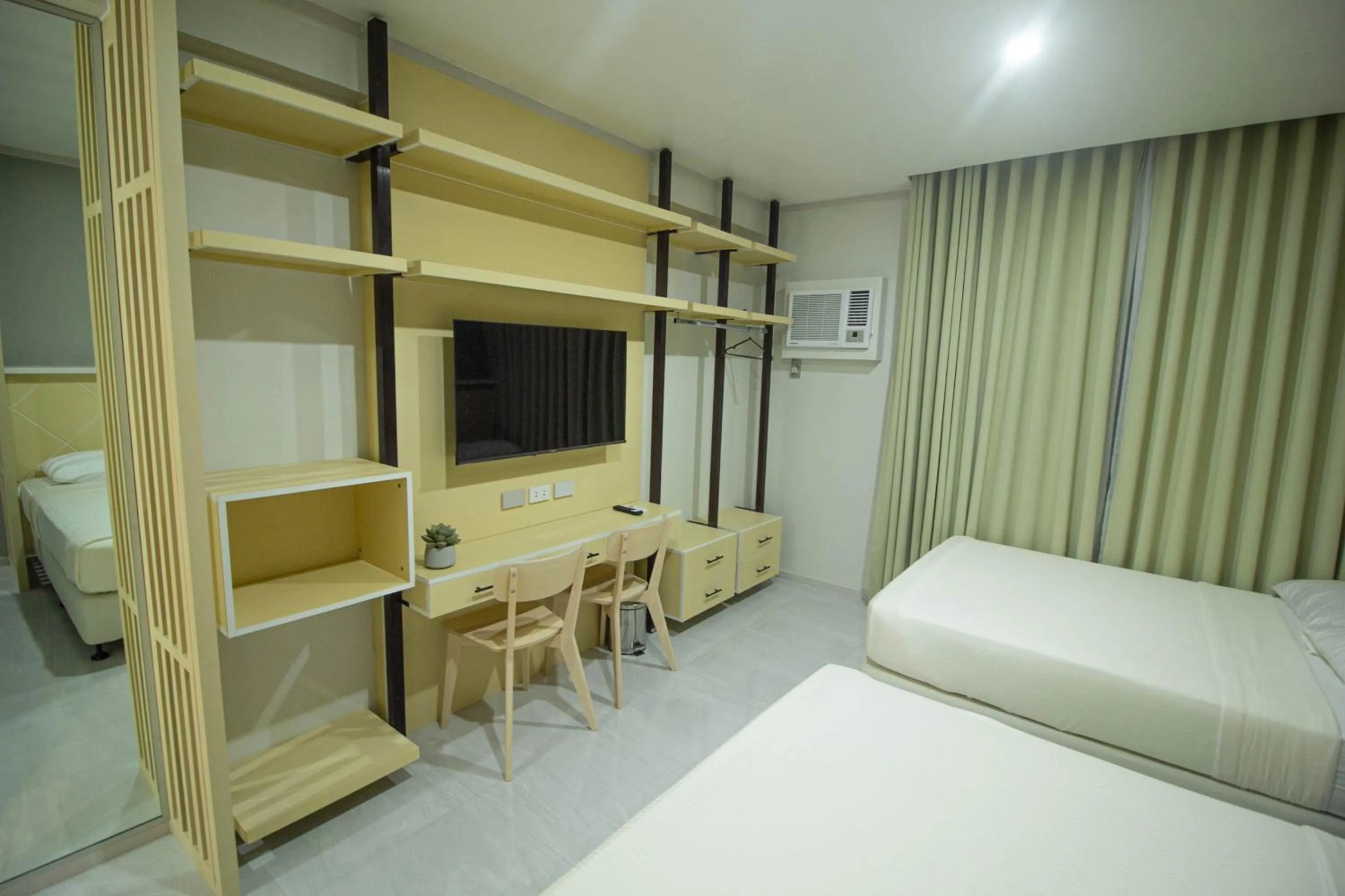 TV and multimedia, Bed in Twin Hearts Residences 1