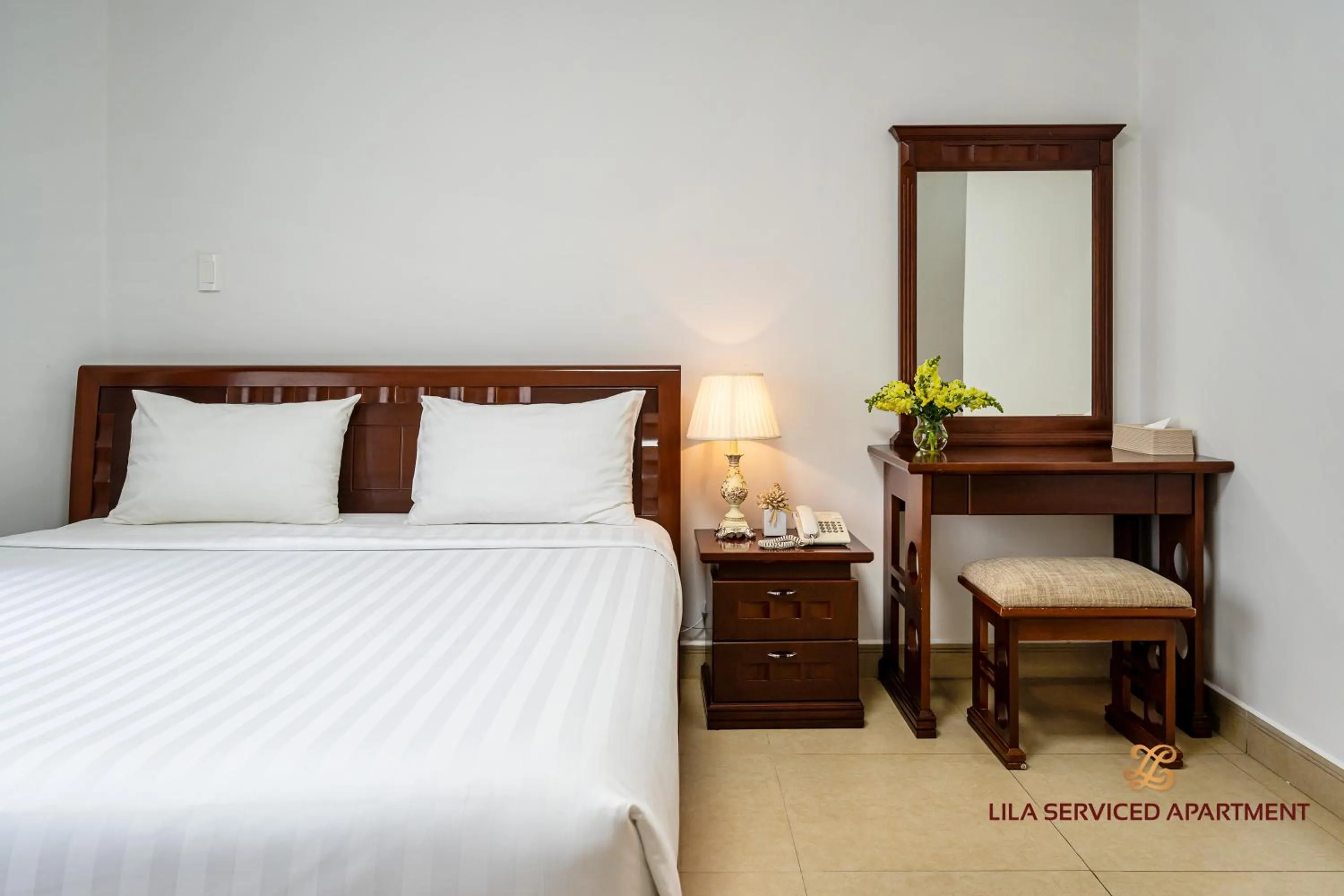 Bed in LILA Hotel & Apartments