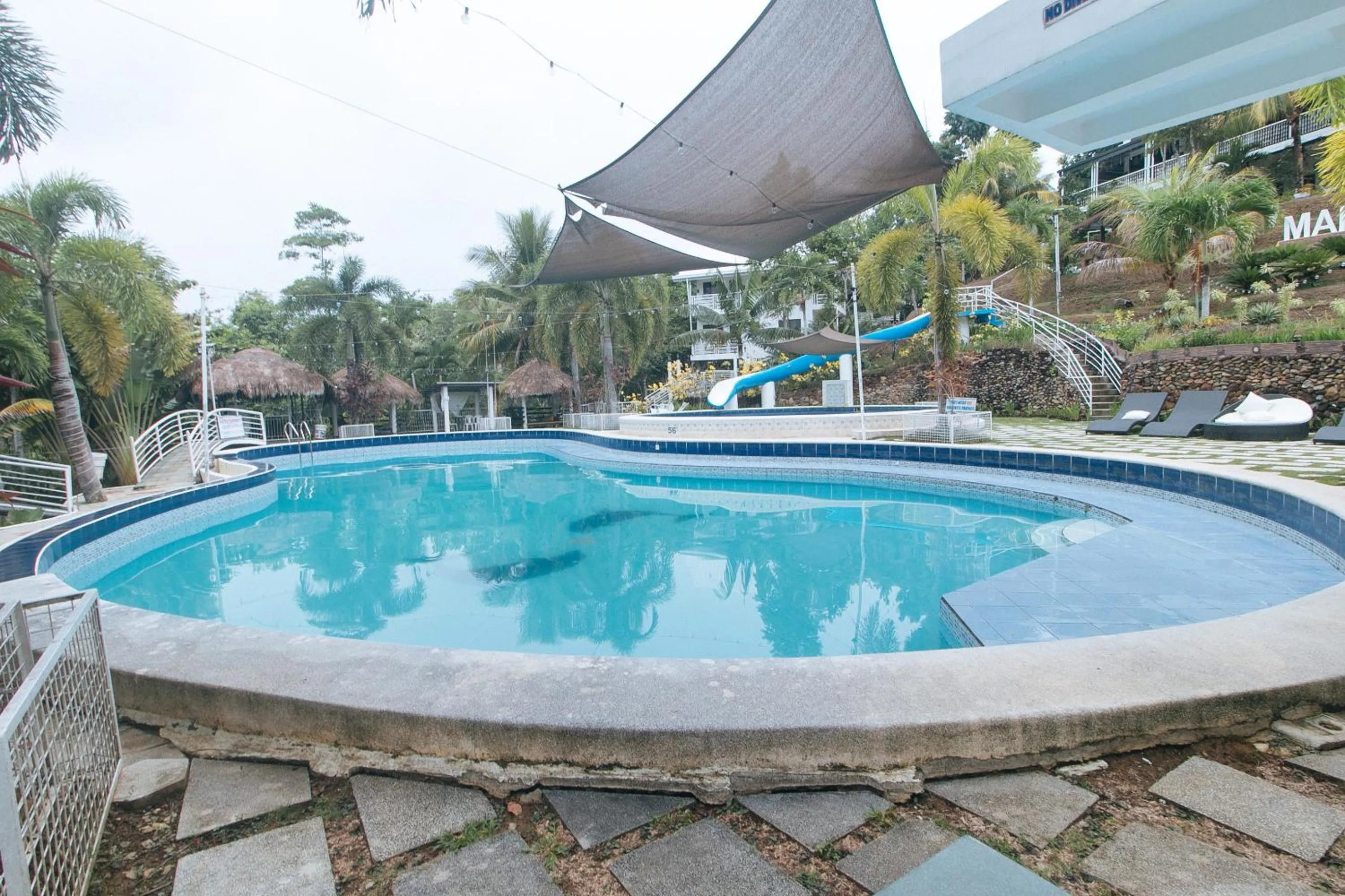 Swimming pool in RedDoorz @ Marceily Point Resort Guimaras