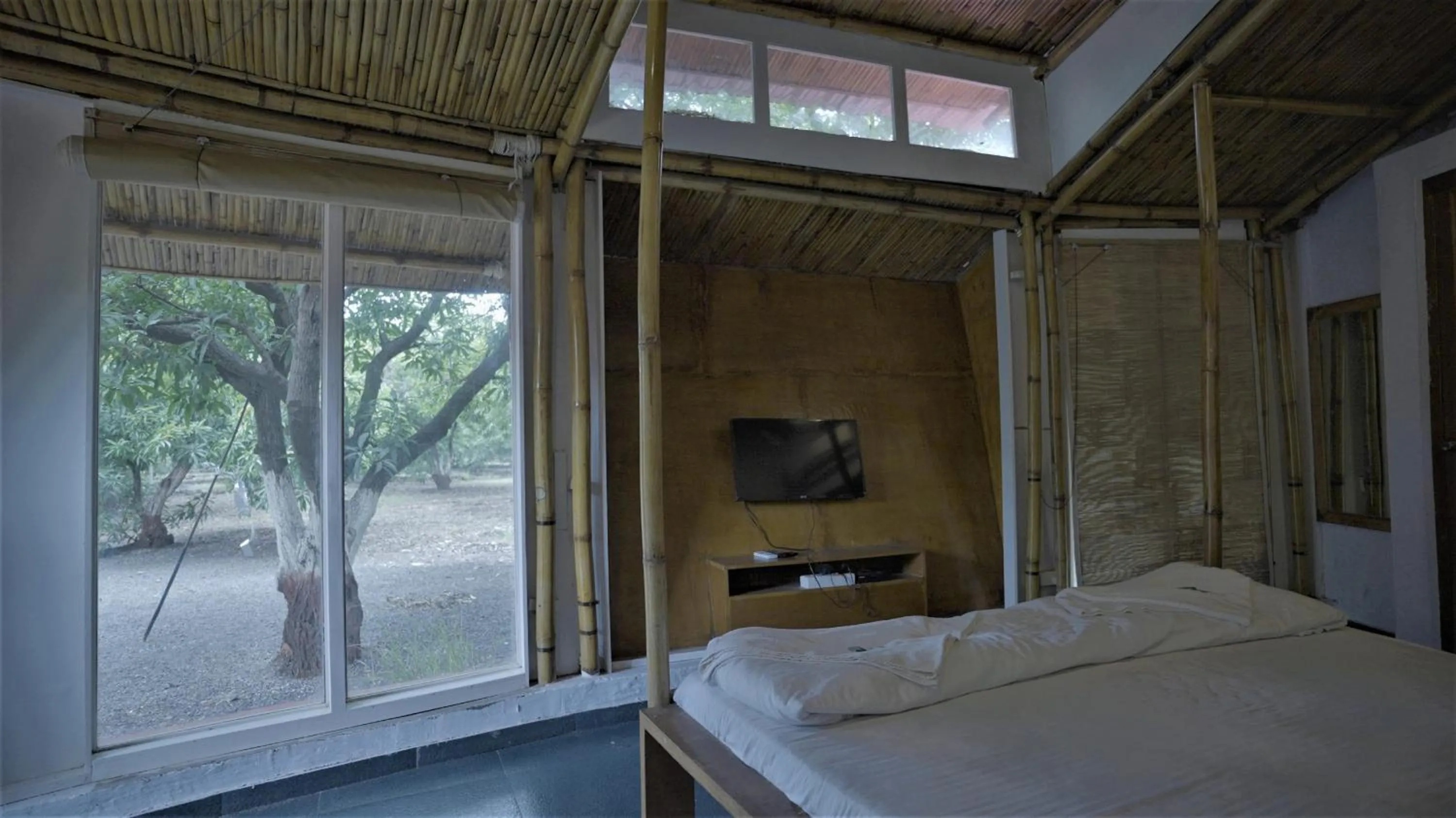 Bedroom, Bed in Amraness Luxury Resort Sasan Gir