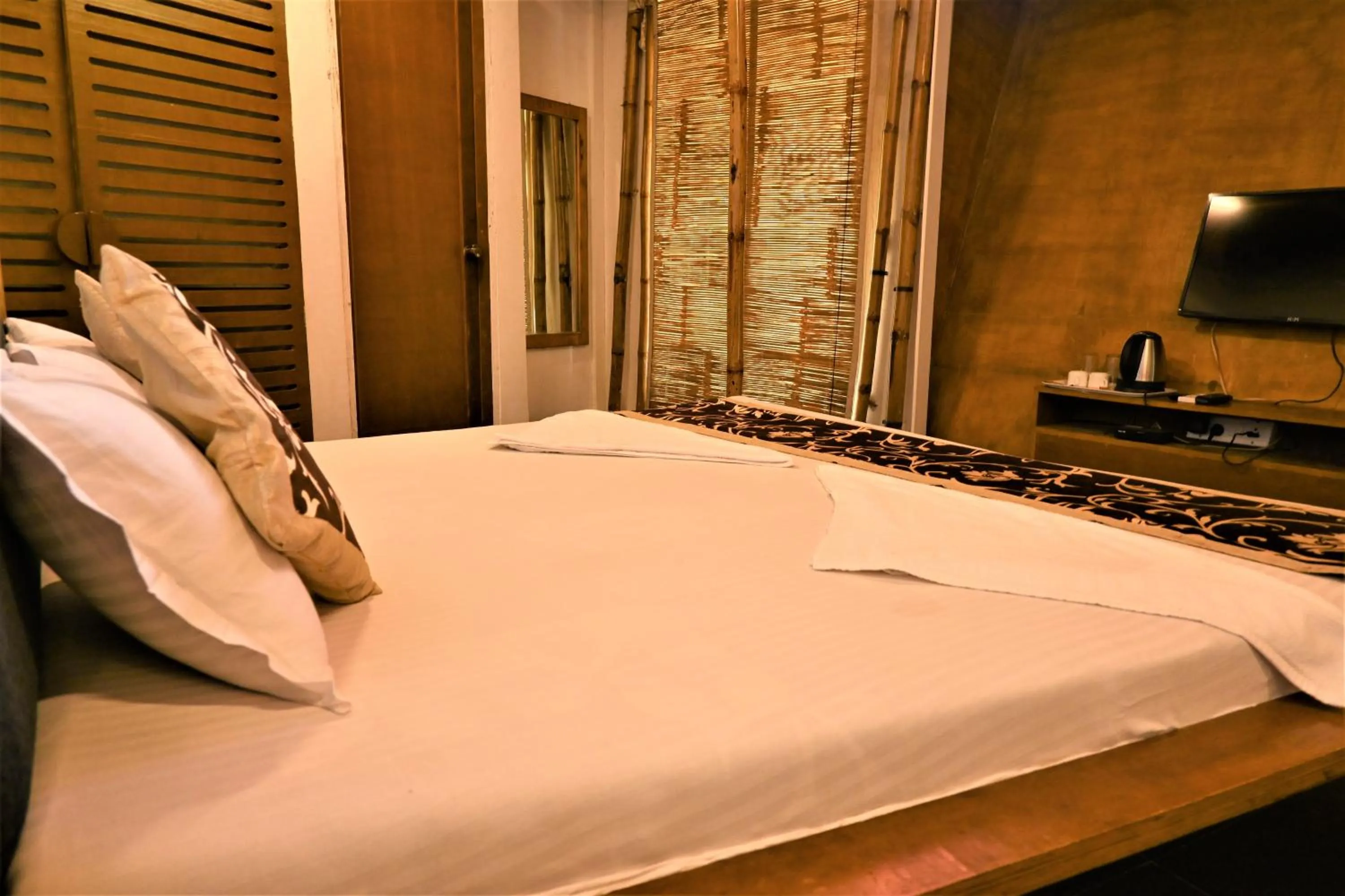Bedroom, Bed in Amraness Luxury Resort Sasan Gir