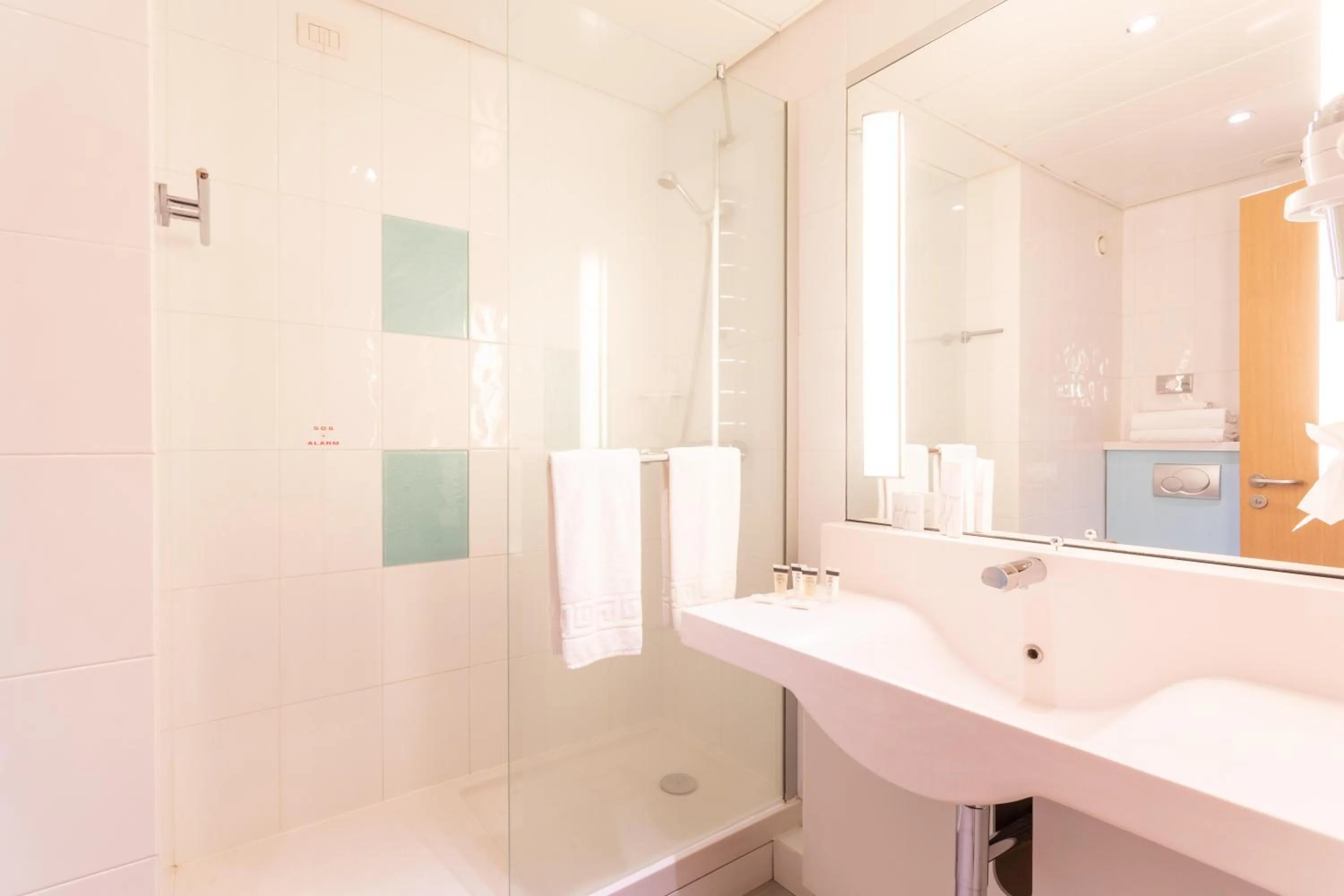 Bathroom in Living Place Hotel