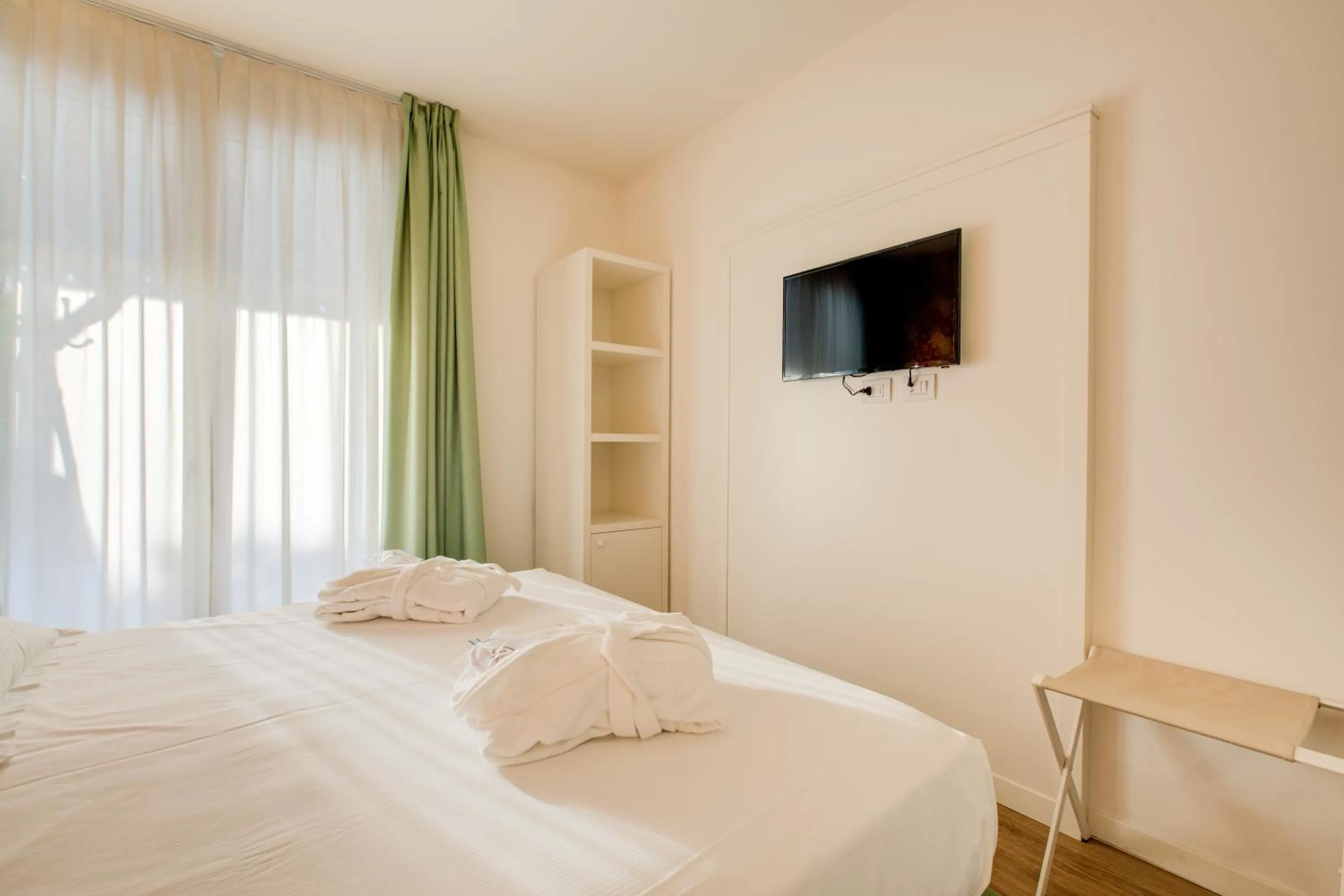 Photo of the whole room, Bed in Rimini Suite Hotel