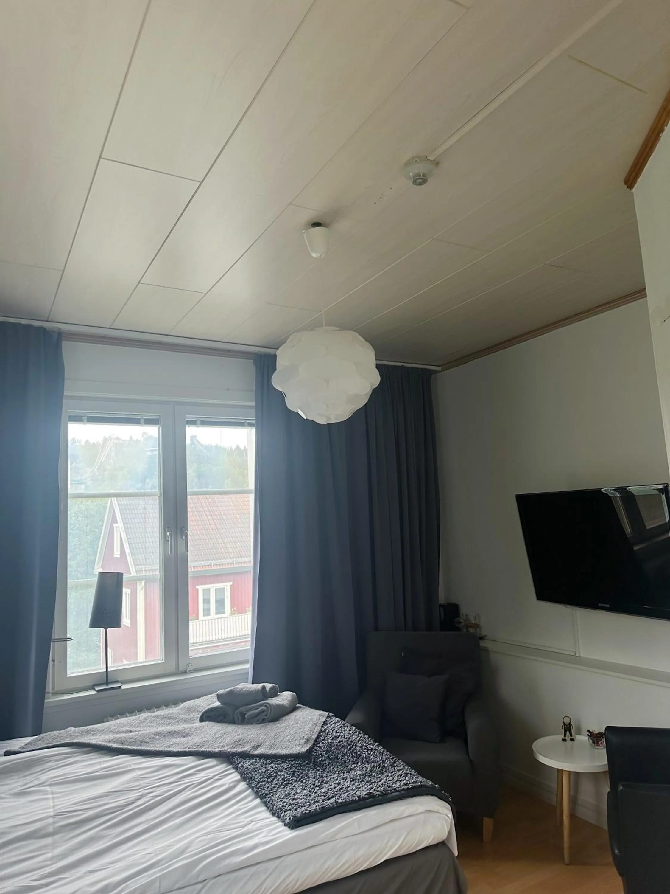 Seating area, Bed in Park Hotell