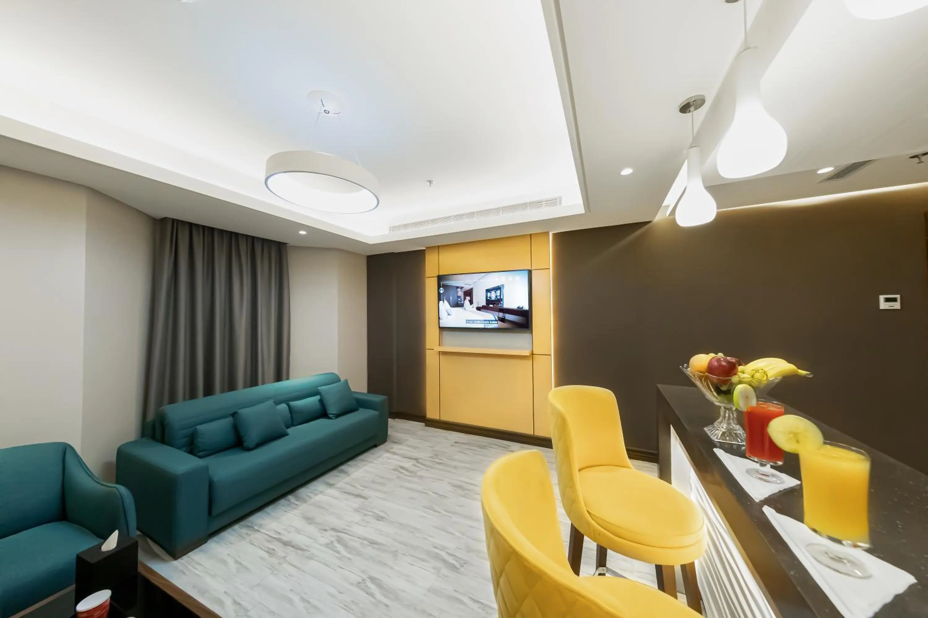 Communal lounge/ TV room in Boudl Al Sulimanyah