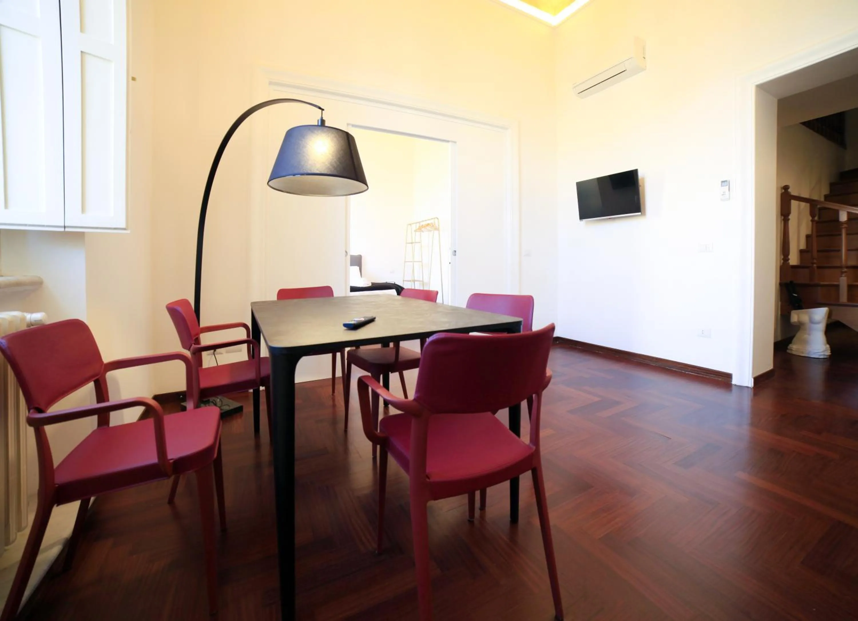 Communal lounge/ TV room in LUCIANO MONTI APARTMENT