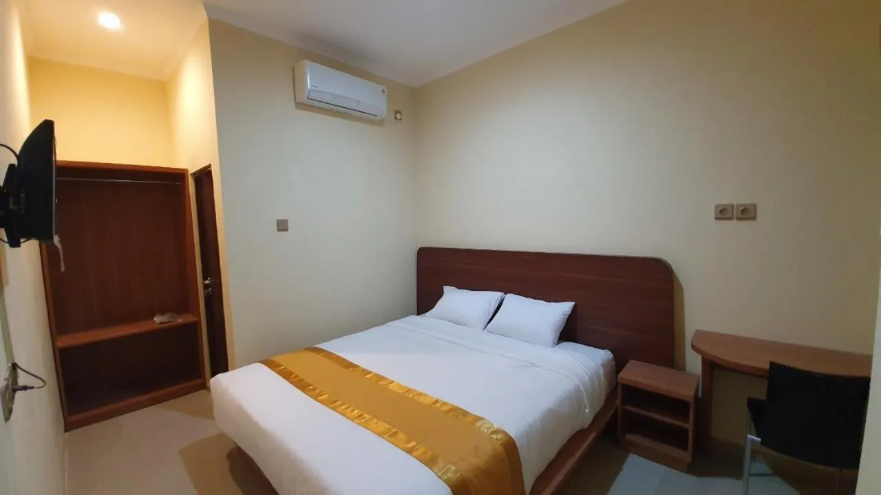 Bed in Harmony Inn Belitung - City Hotel