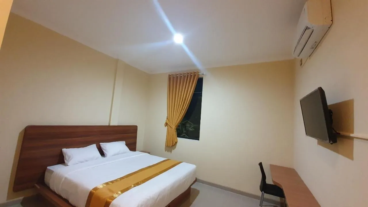 Bedroom, Bed in Harmony Inn Belitung - City Hotel
