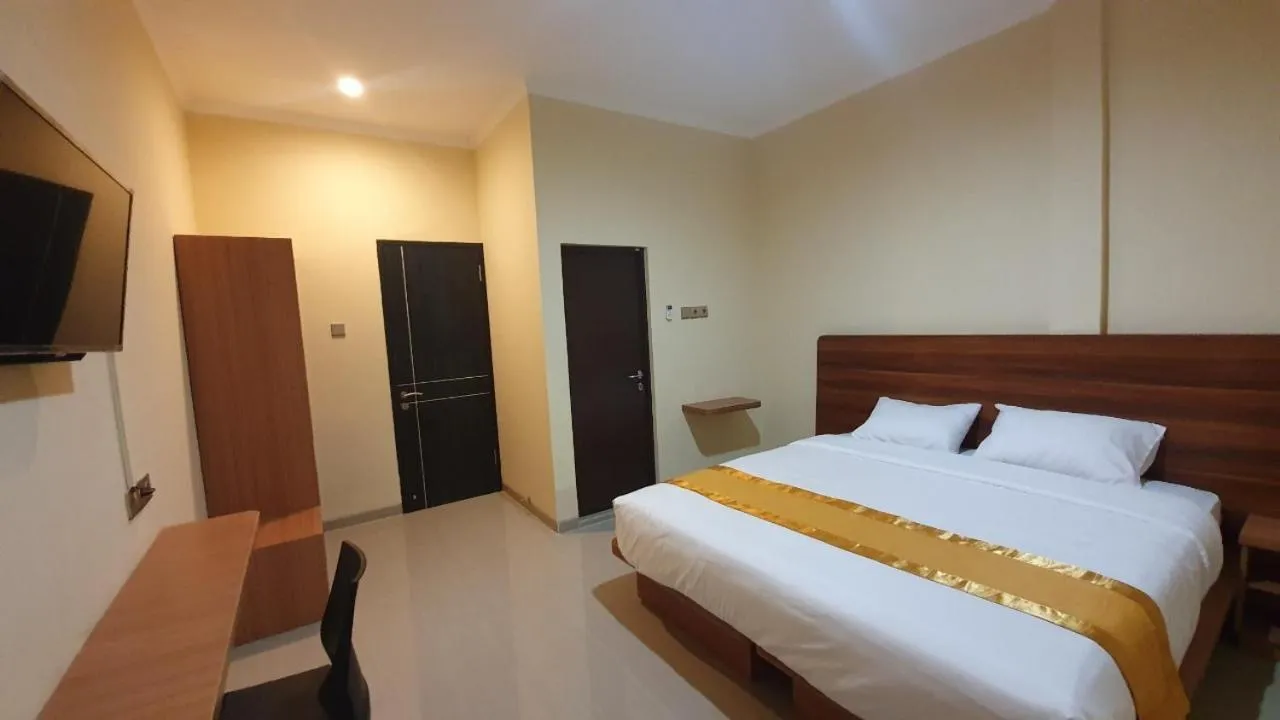 Bedroom, Bed in Harmony Inn Belitung - City Hotel