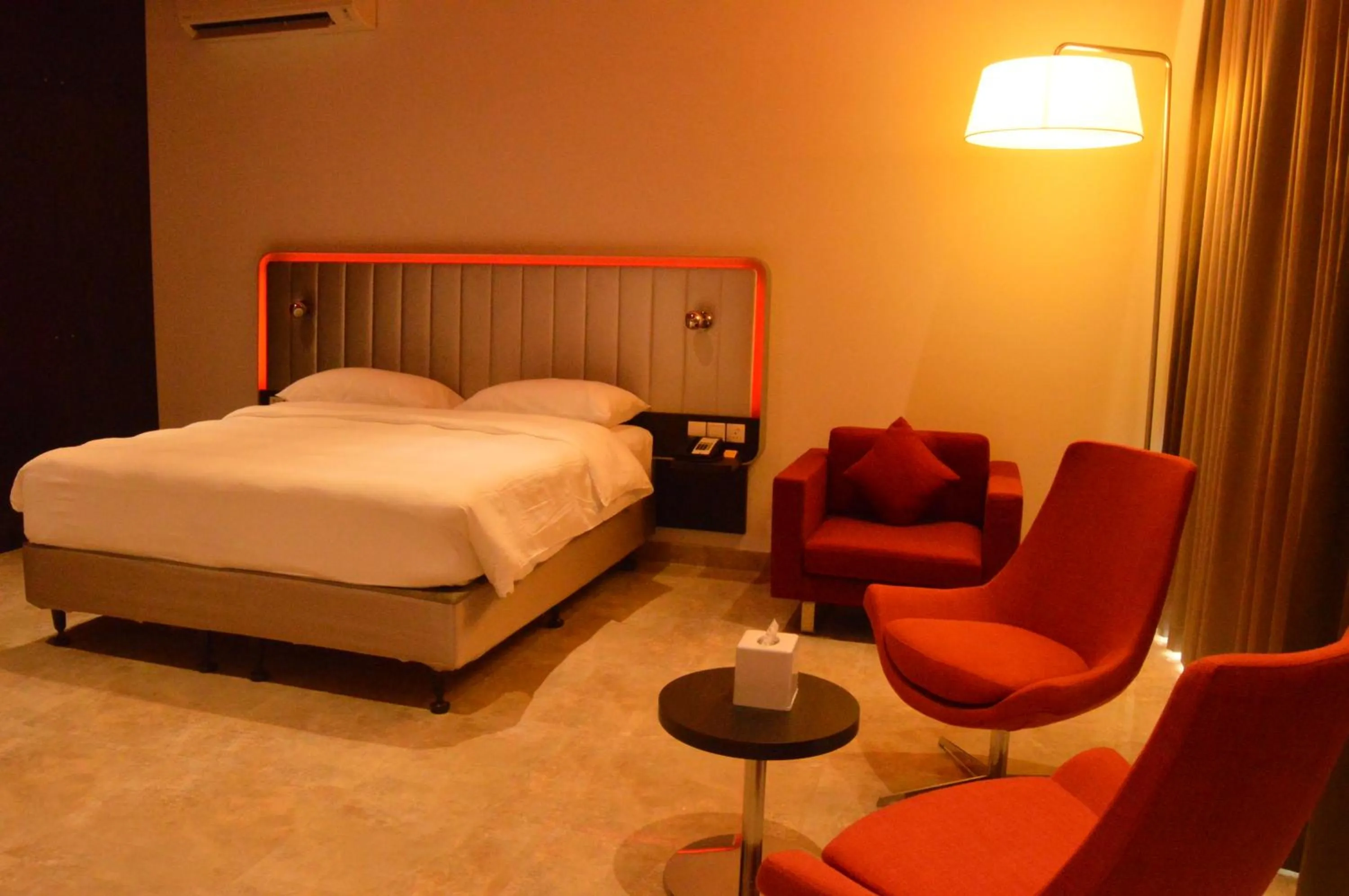 Seating area, Bed in Park Inn by Radisson Hotel and Residence Duqm