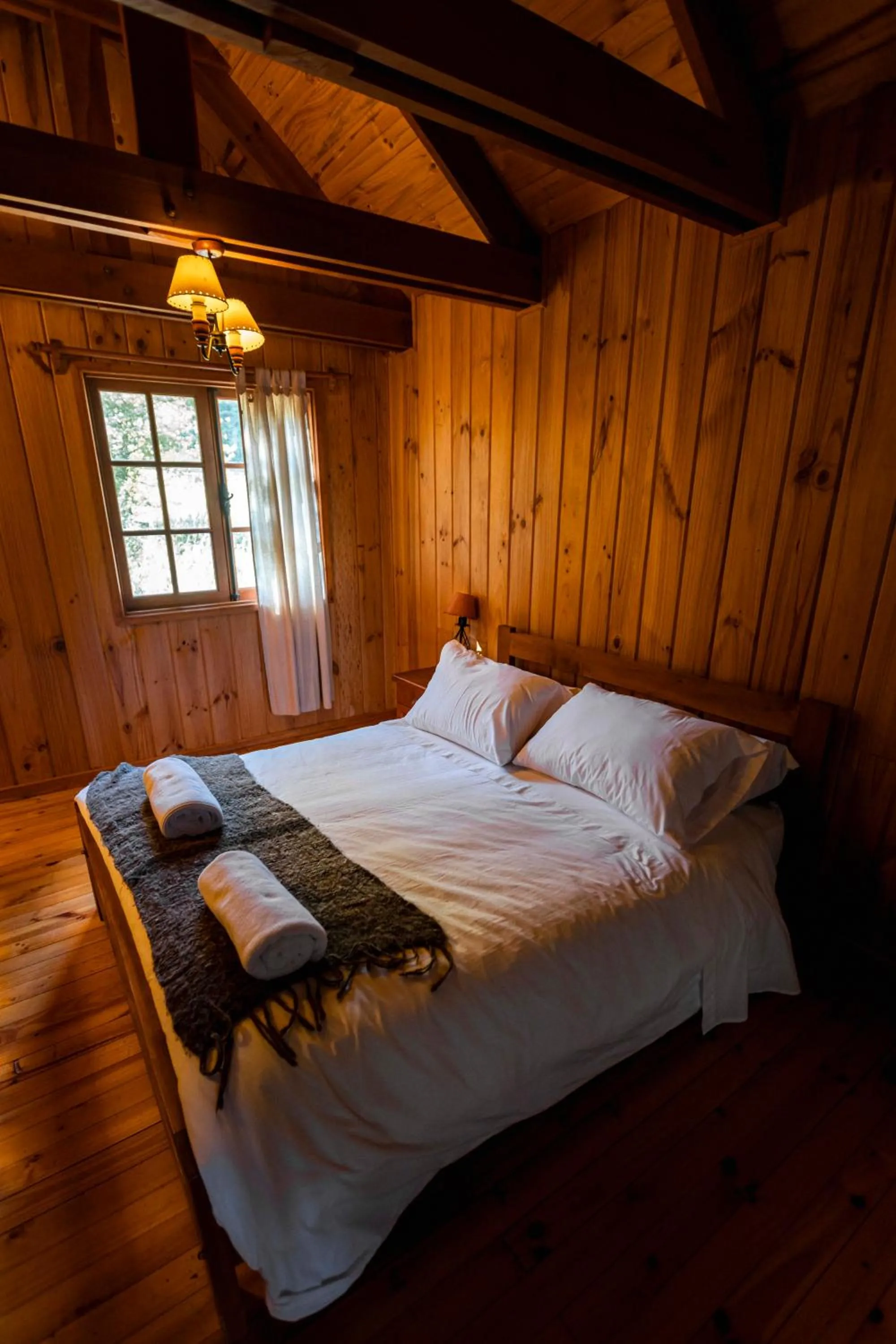 Bed in Green Baker Lodge