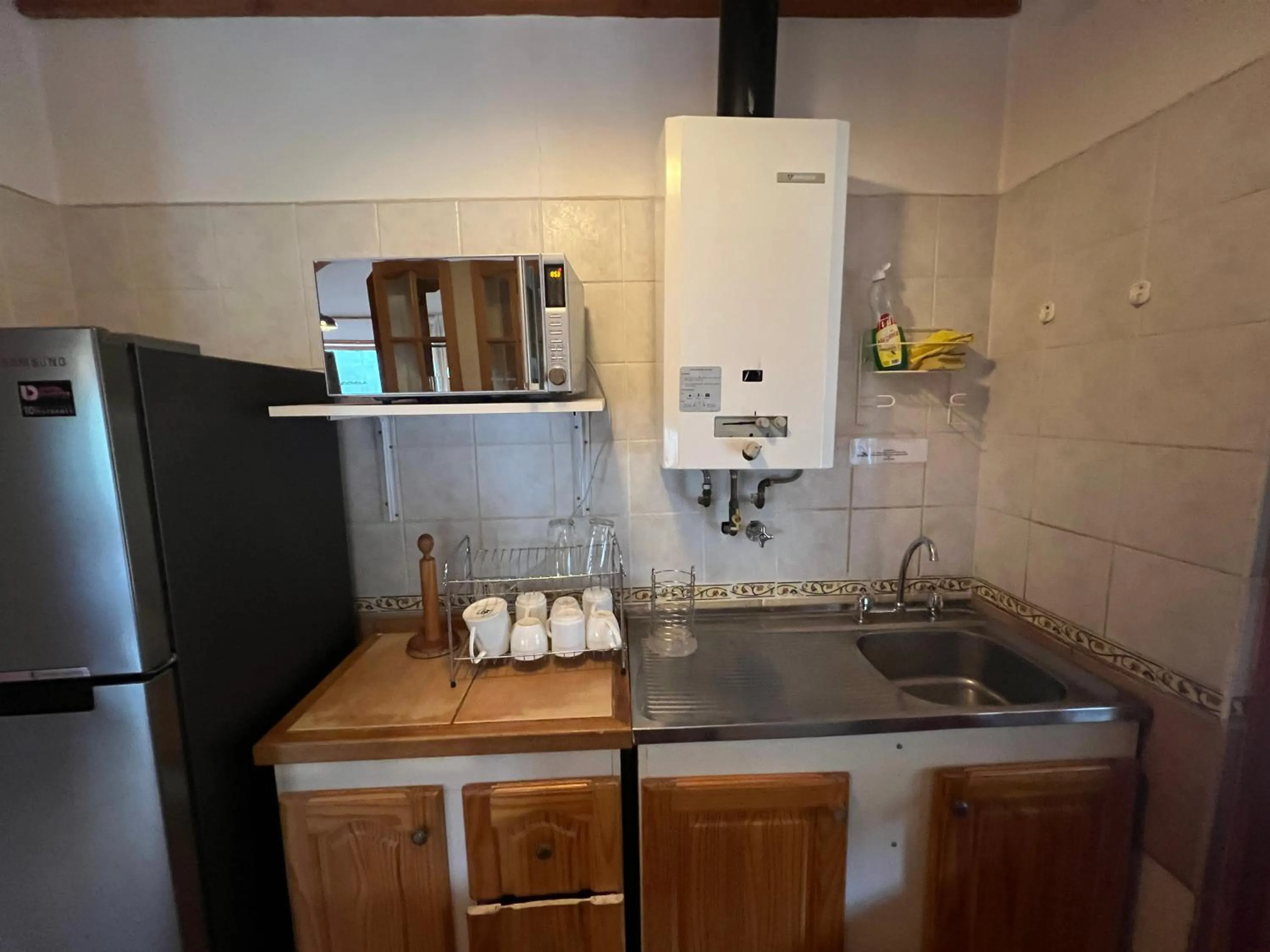 Kitchen or kitchenette in Green Baker Lodge