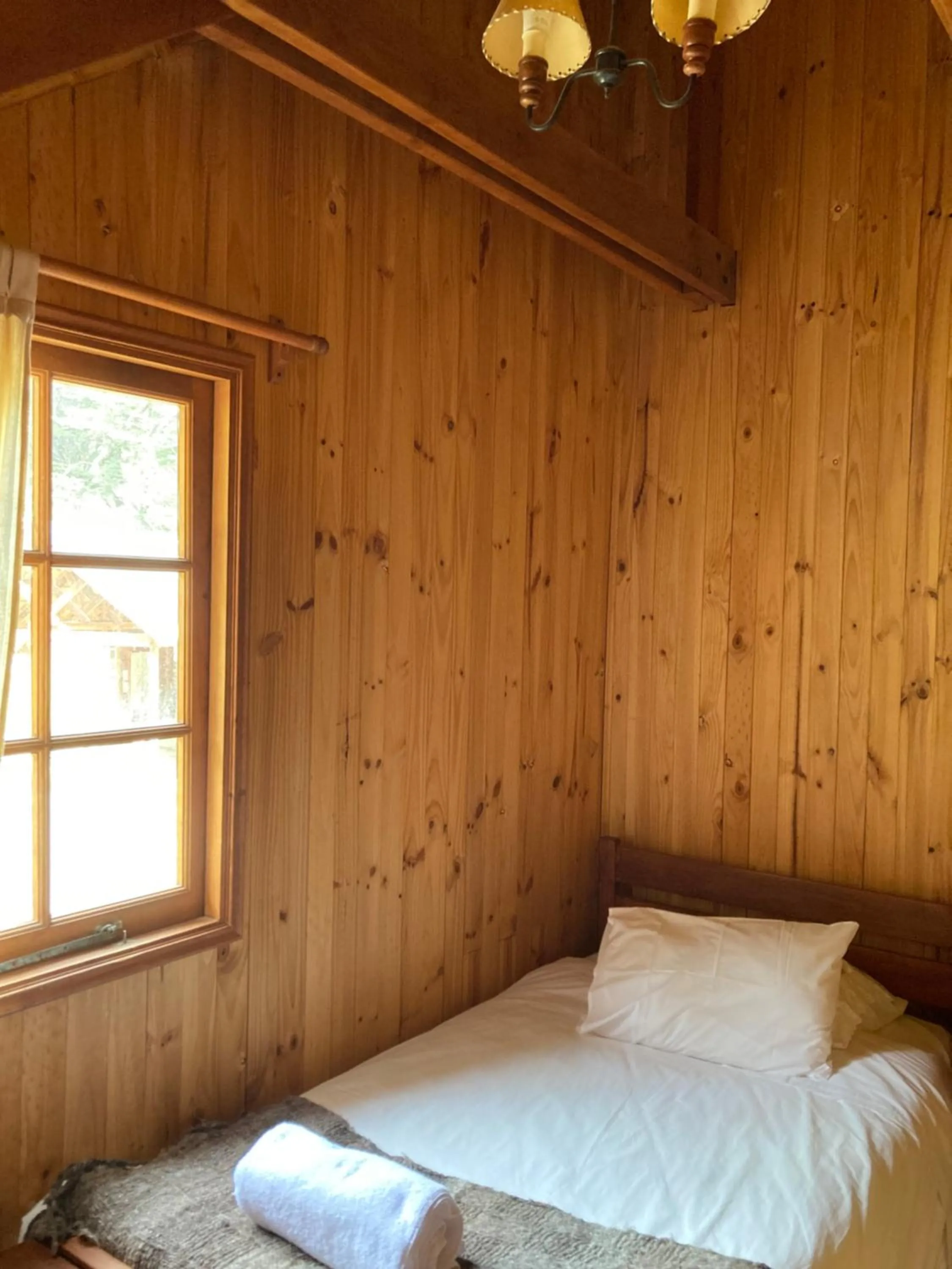 Bed in Green Baker Lodge