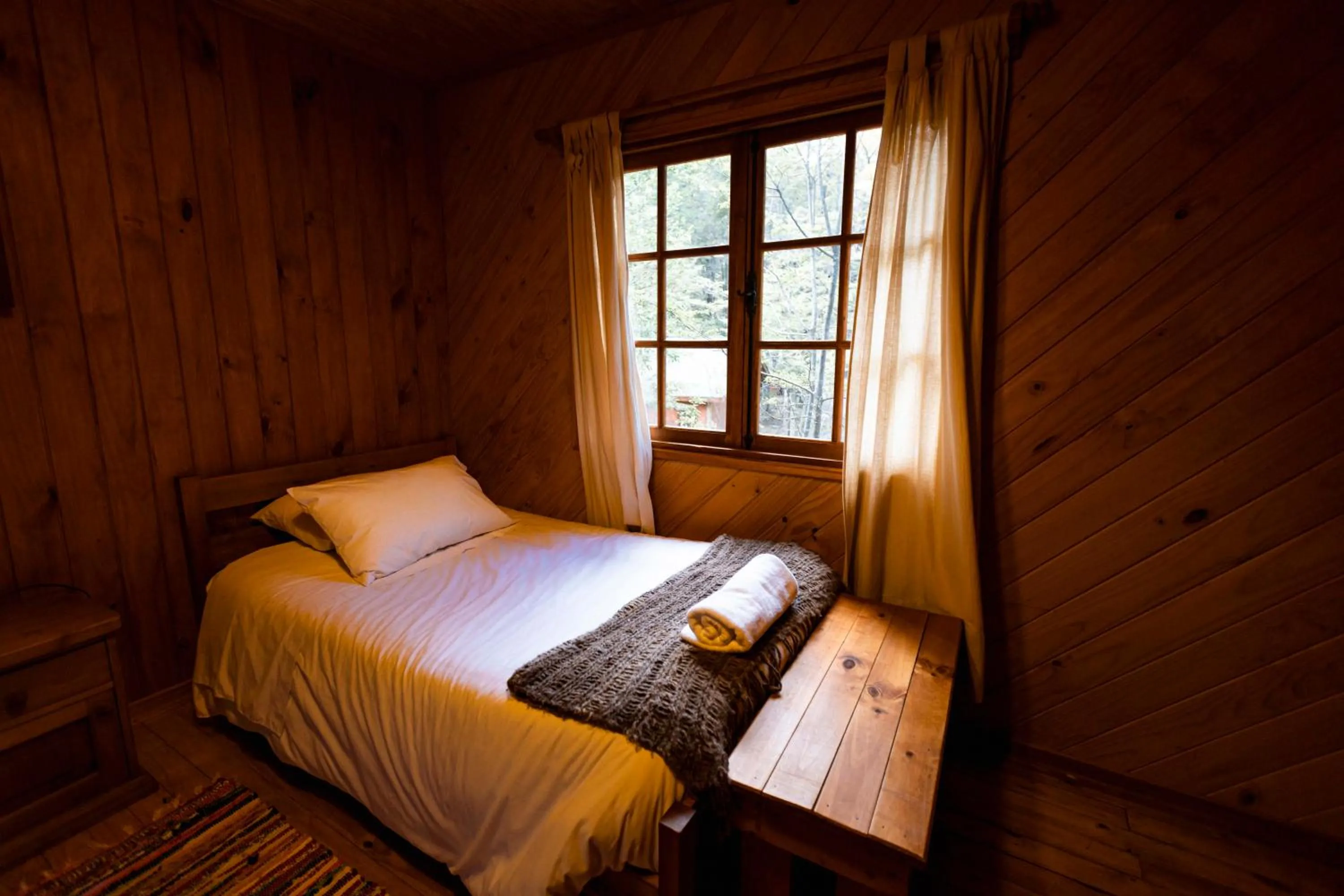 Bed in Green Baker Lodge