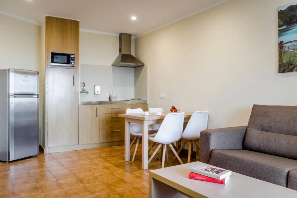 Kitchen or kitchenette in Apartamentos Blancala