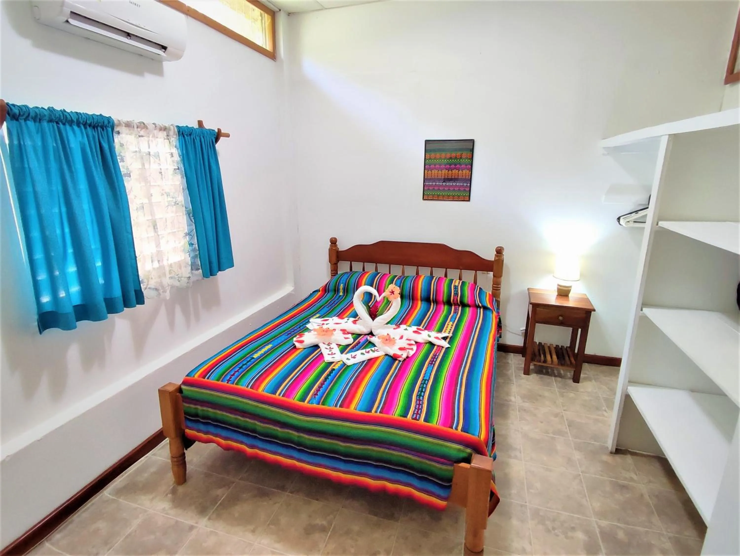 Bed in Maya Mountain Lodge