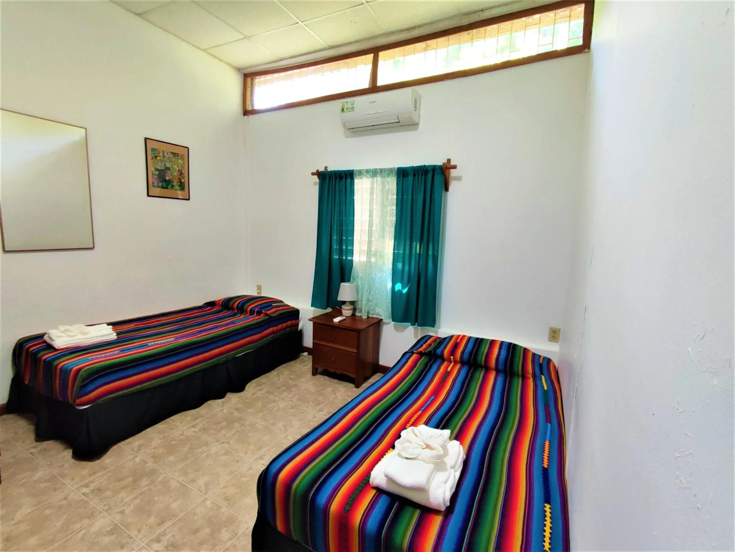 Bed in Maya Mountain Lodge