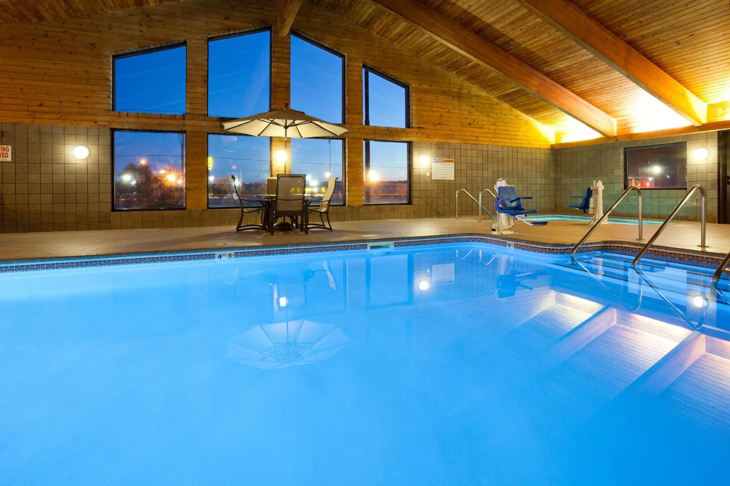 Swimming pool in AmericInn by Wyndham Eau Claire