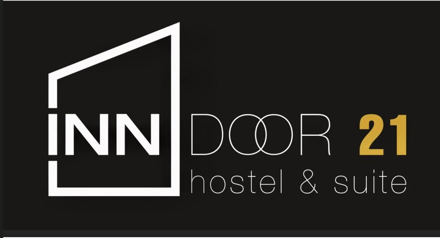 Property logo or sign in Inn Door 21 - Hostel & Suite