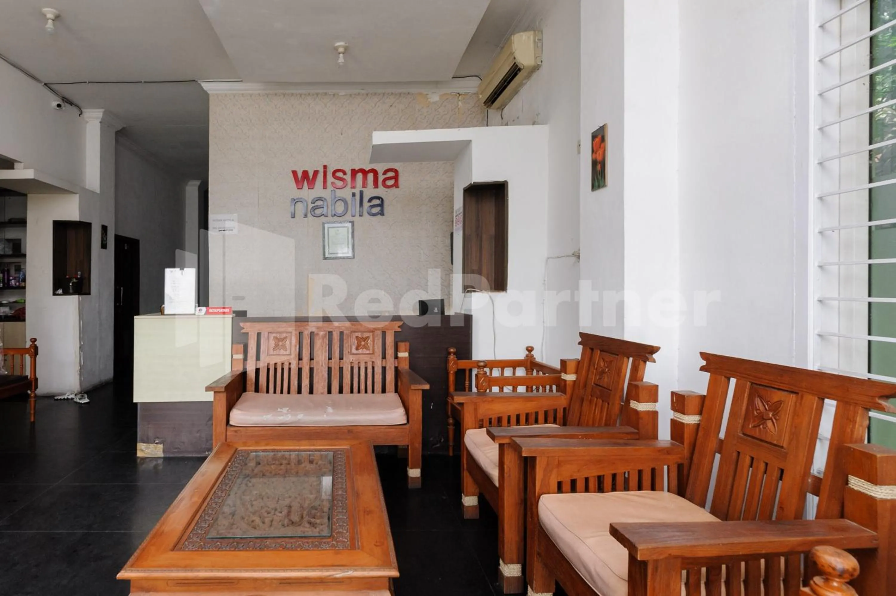Seating area in RedDoorz at Wisma Nabila Syariah near Masjid Raya Baiturrahman Banda Aceh