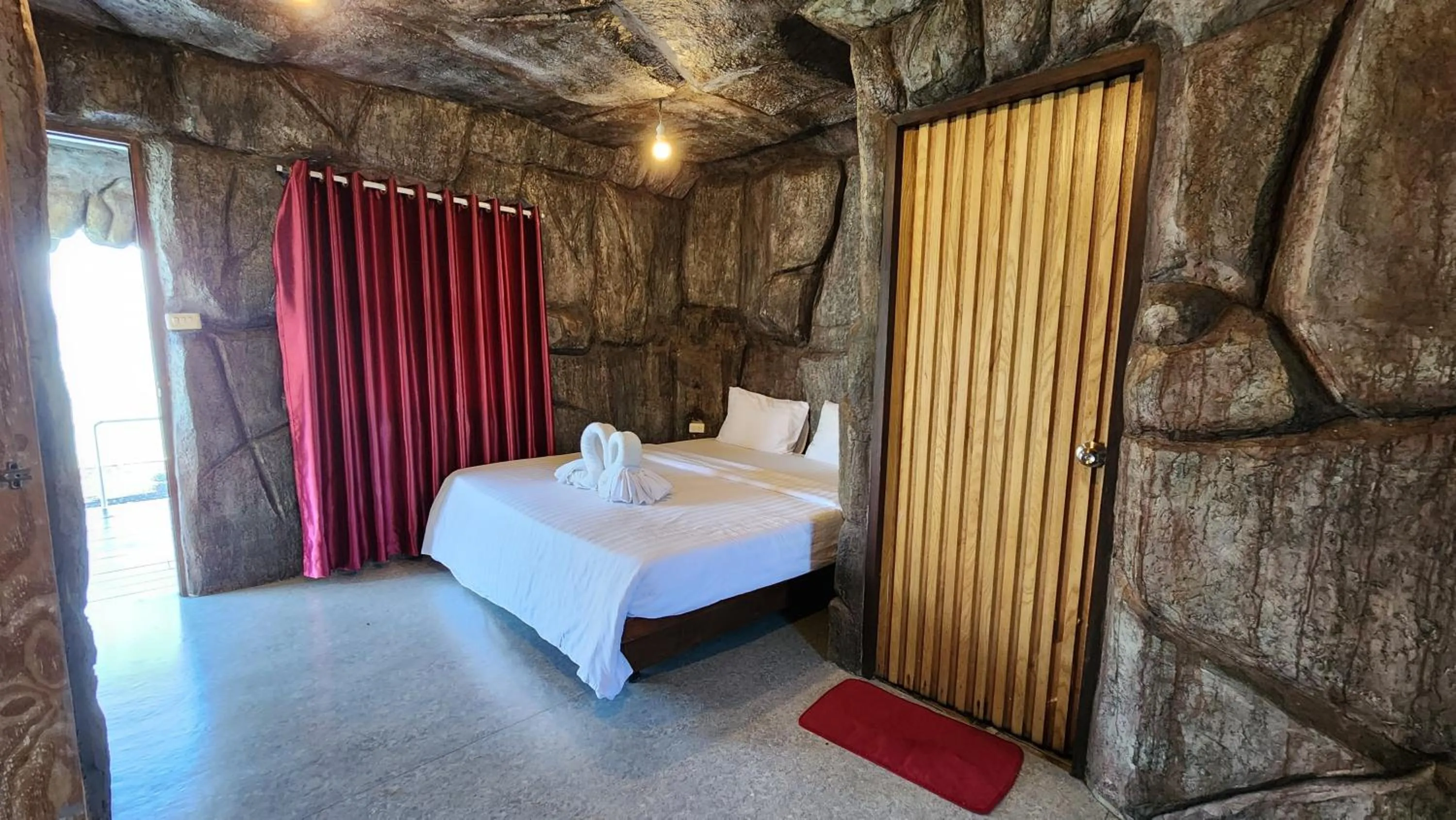 Bed in บ้านไร่ วรรณ วาลย์ รีสอร์ท