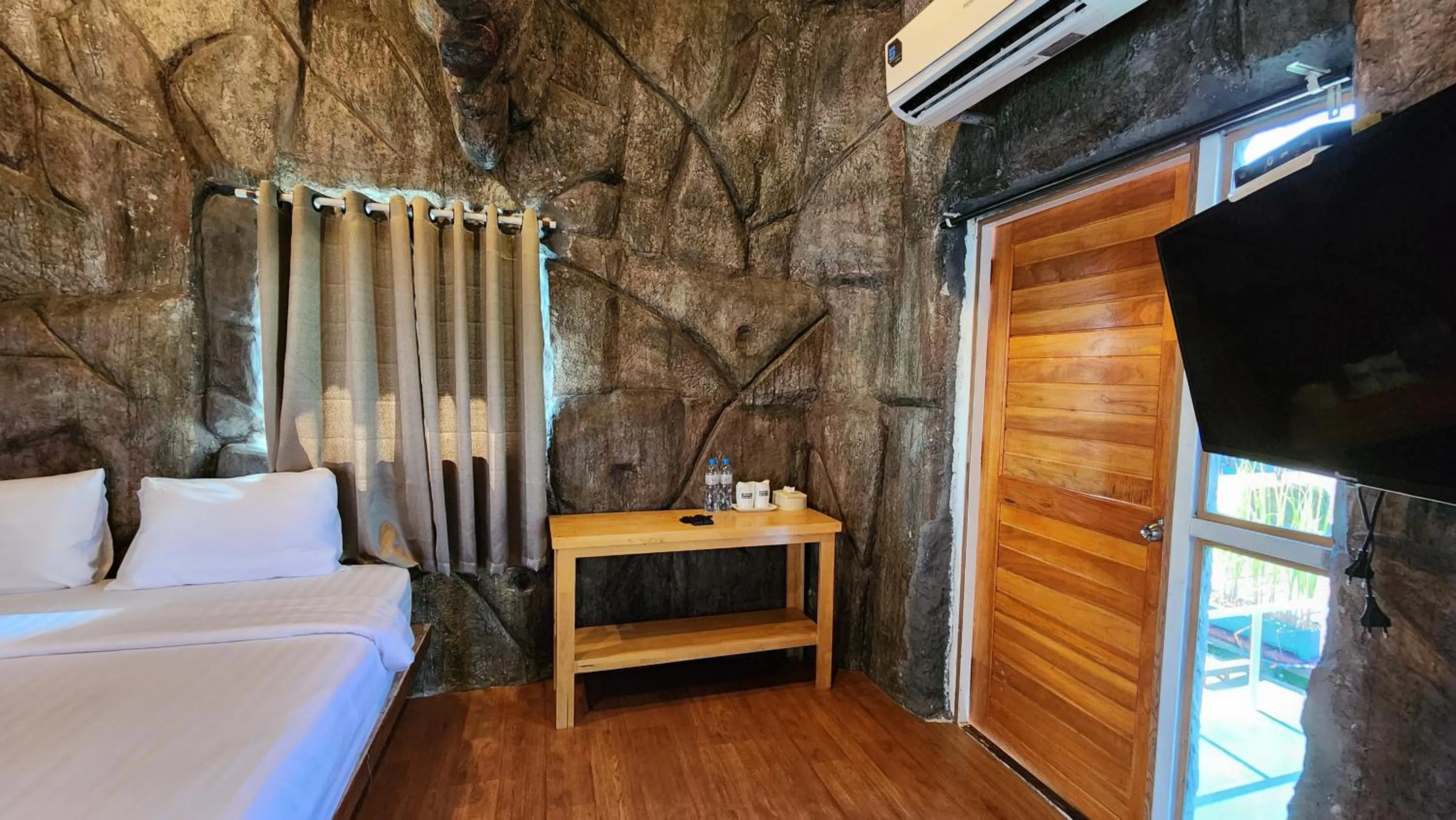 Bed in บ้านไร่ วรรณ วาลย์ รีสอร์ท