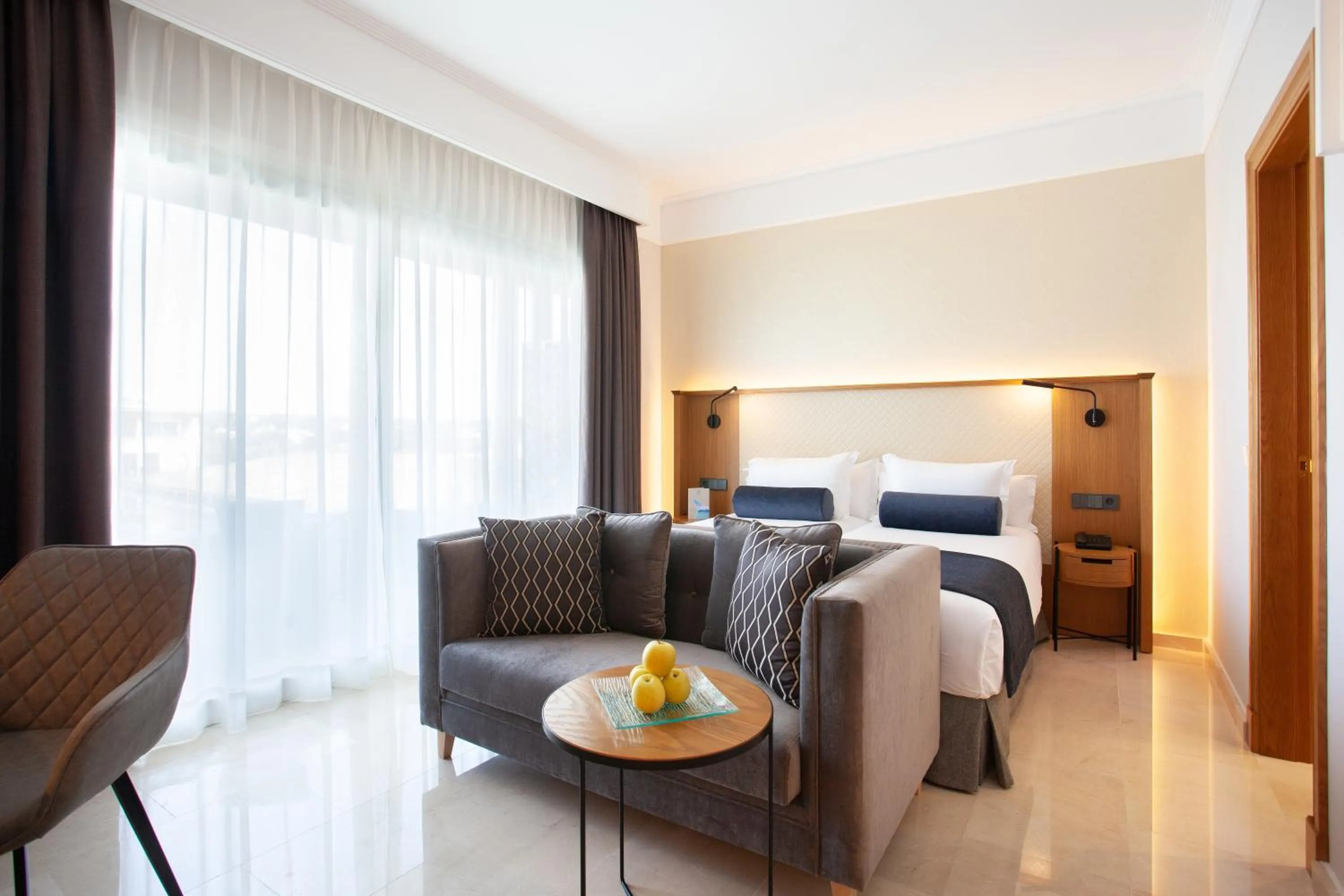 Living room, Bed in Grupotel Playa de Palma Suites & Spa