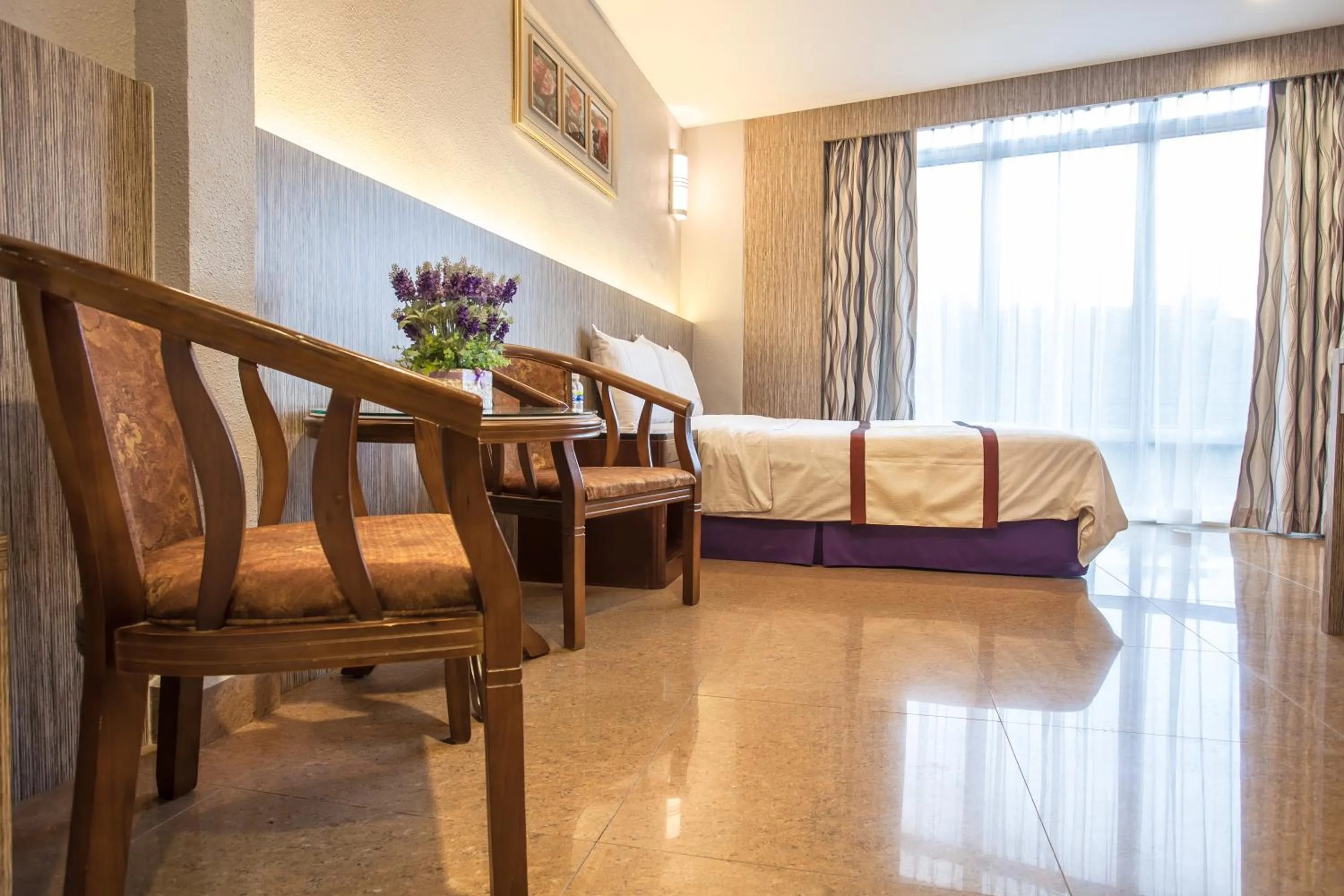 Photo of the whole room, Bed in Lavender Inn Nusa Bestari