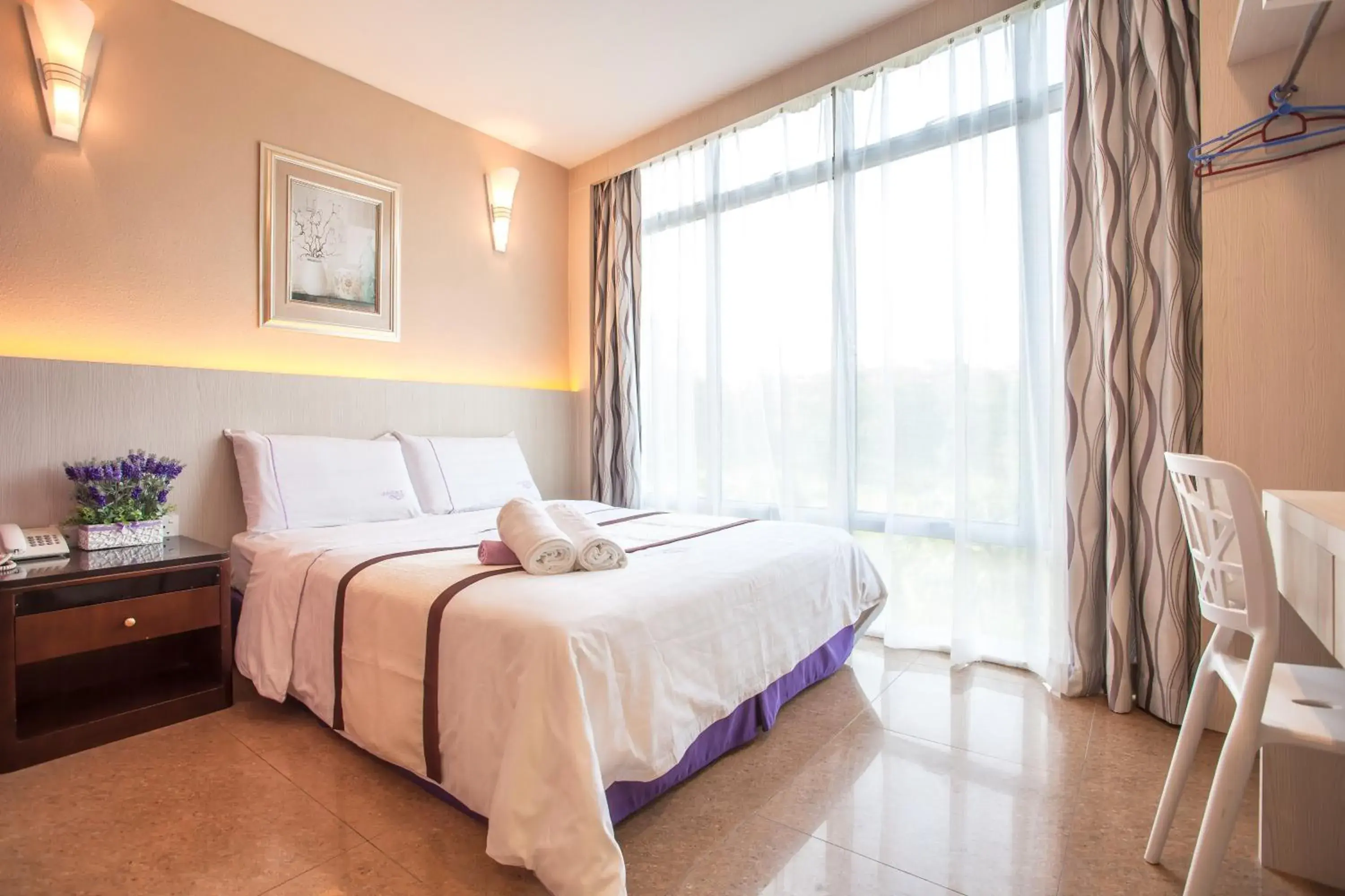Deluxe Double Room in Lavender Inn Nusa Bestari Deluxe Double Room in Lavender Inn Nusa Bestari