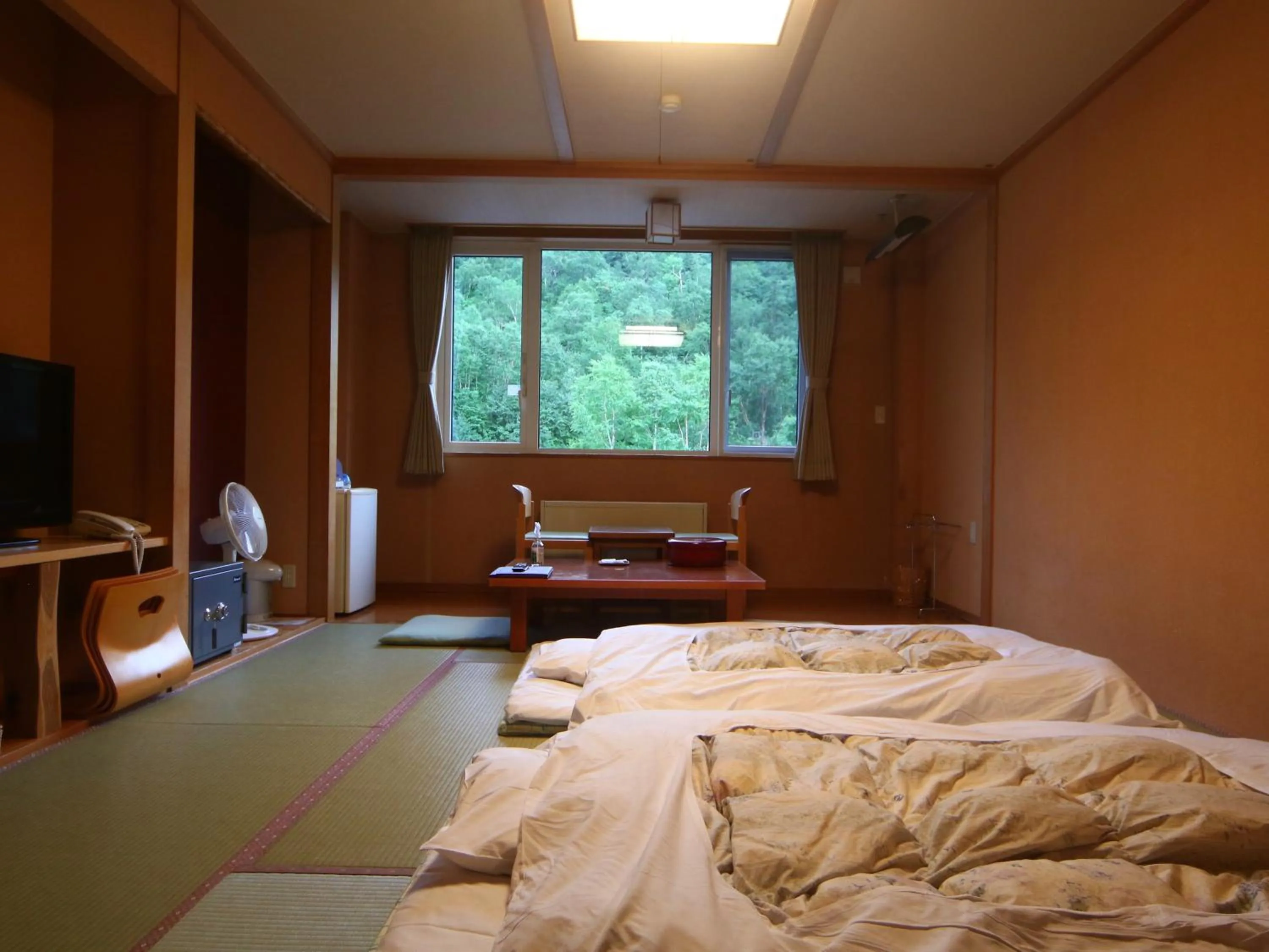 Photo of the whole room, Bed in Kamihoroso
