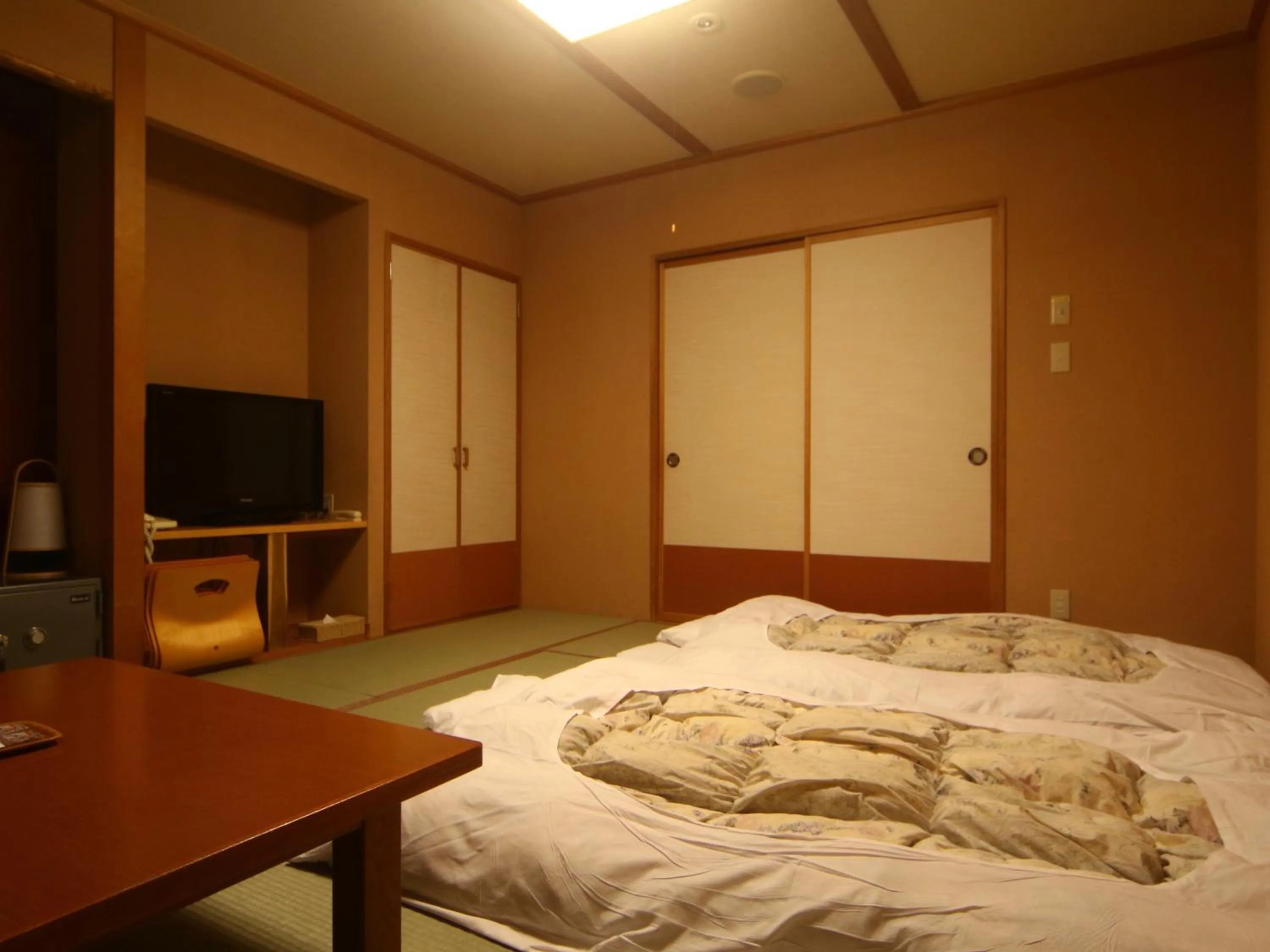 Photo of the whole room, Bed in Kamihoroso