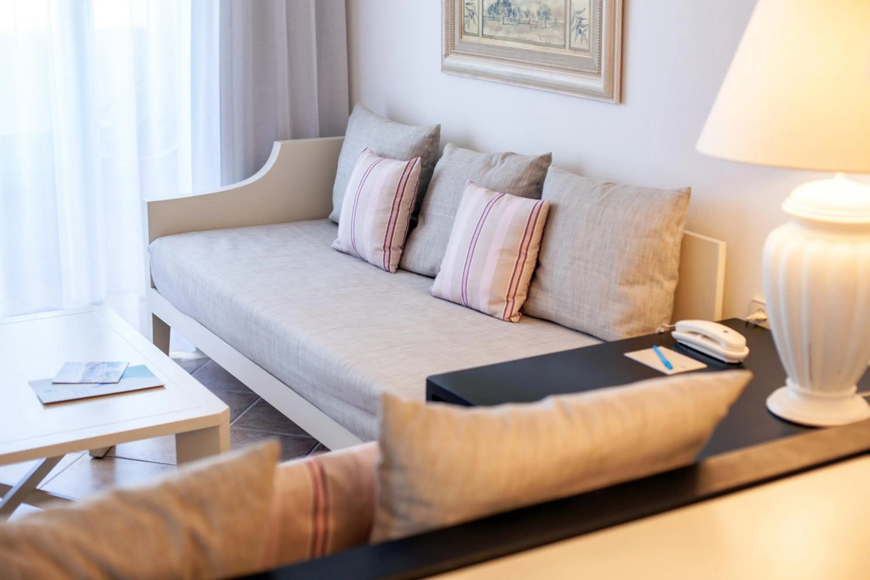 Living room in Grupotel Macarella Suites & Spa