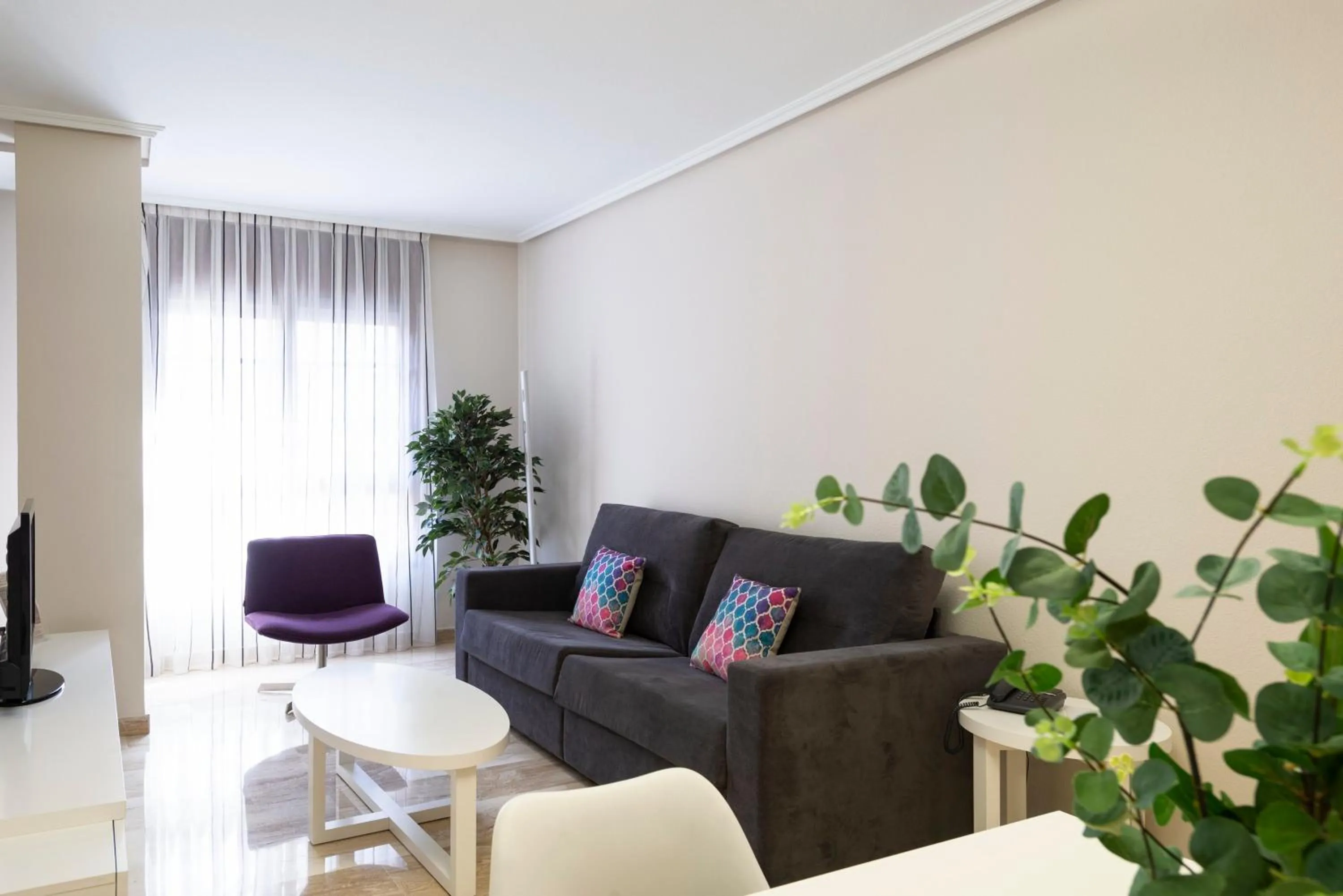 Living room in Aparthotel Los Girasoles